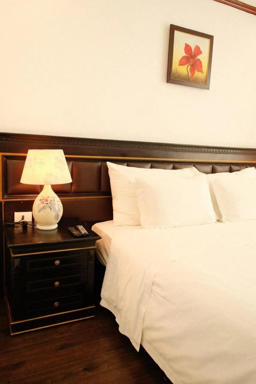 Bed in The Vissai Hotel