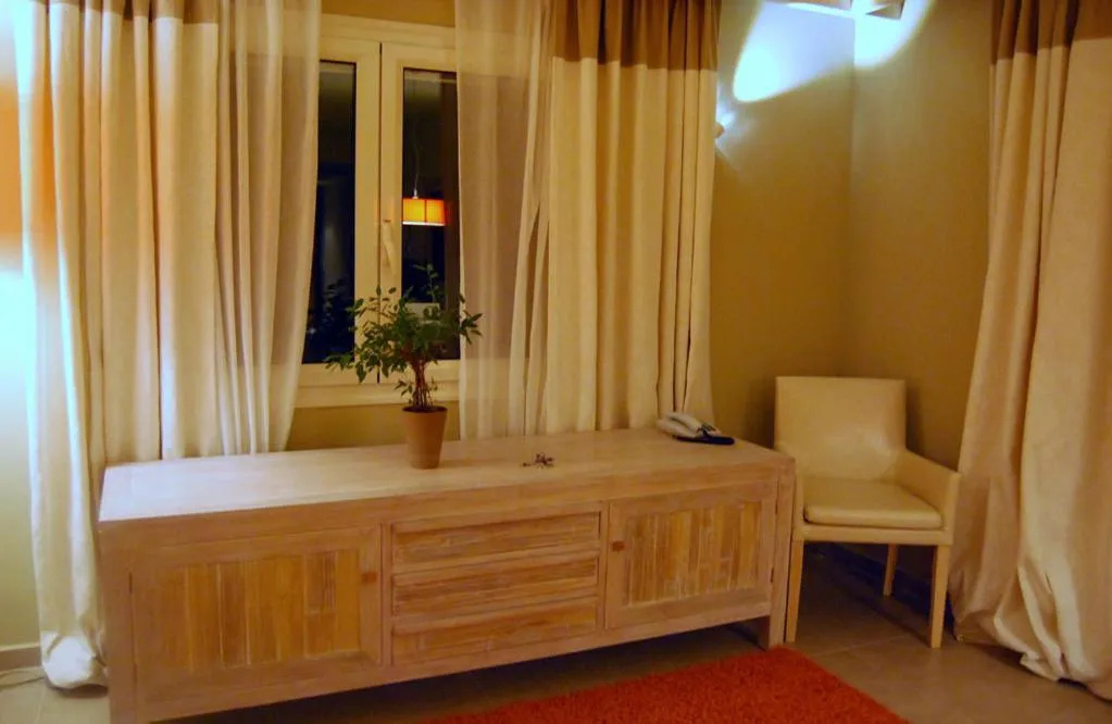 Bed in Astrolabe Hotel