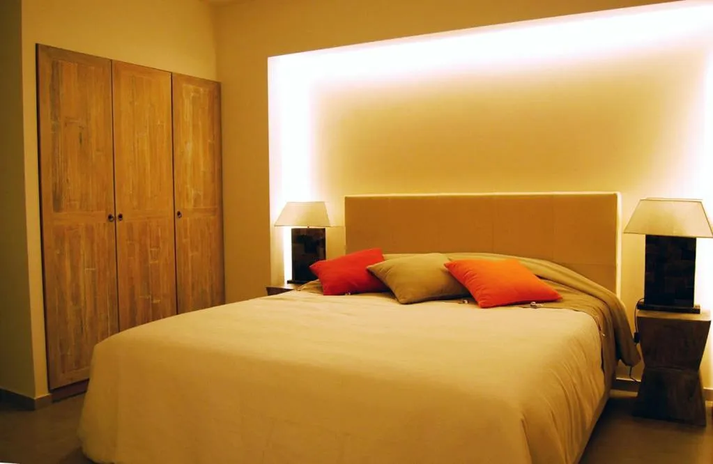 Bed in Astrolabe Hotel