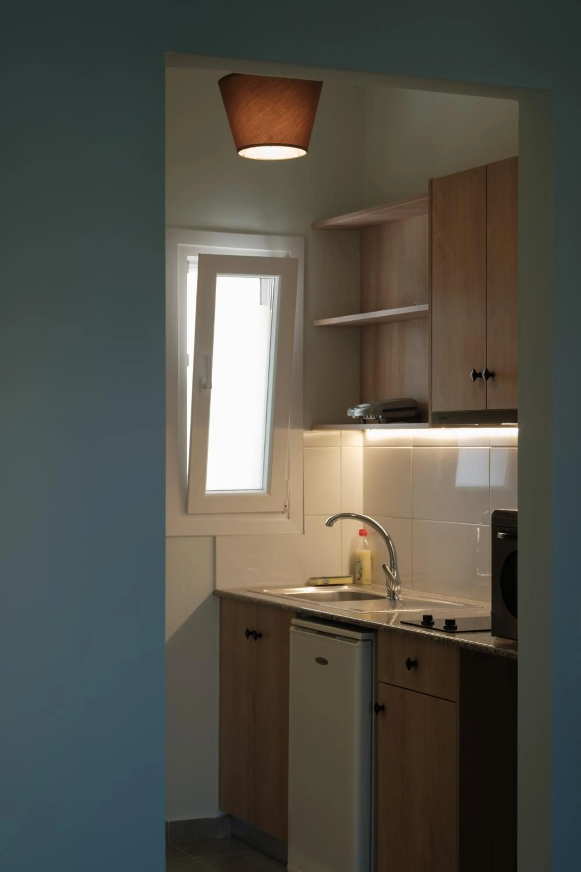 Kitchen or kitchenette in Feeloxenia Corfu Apartments