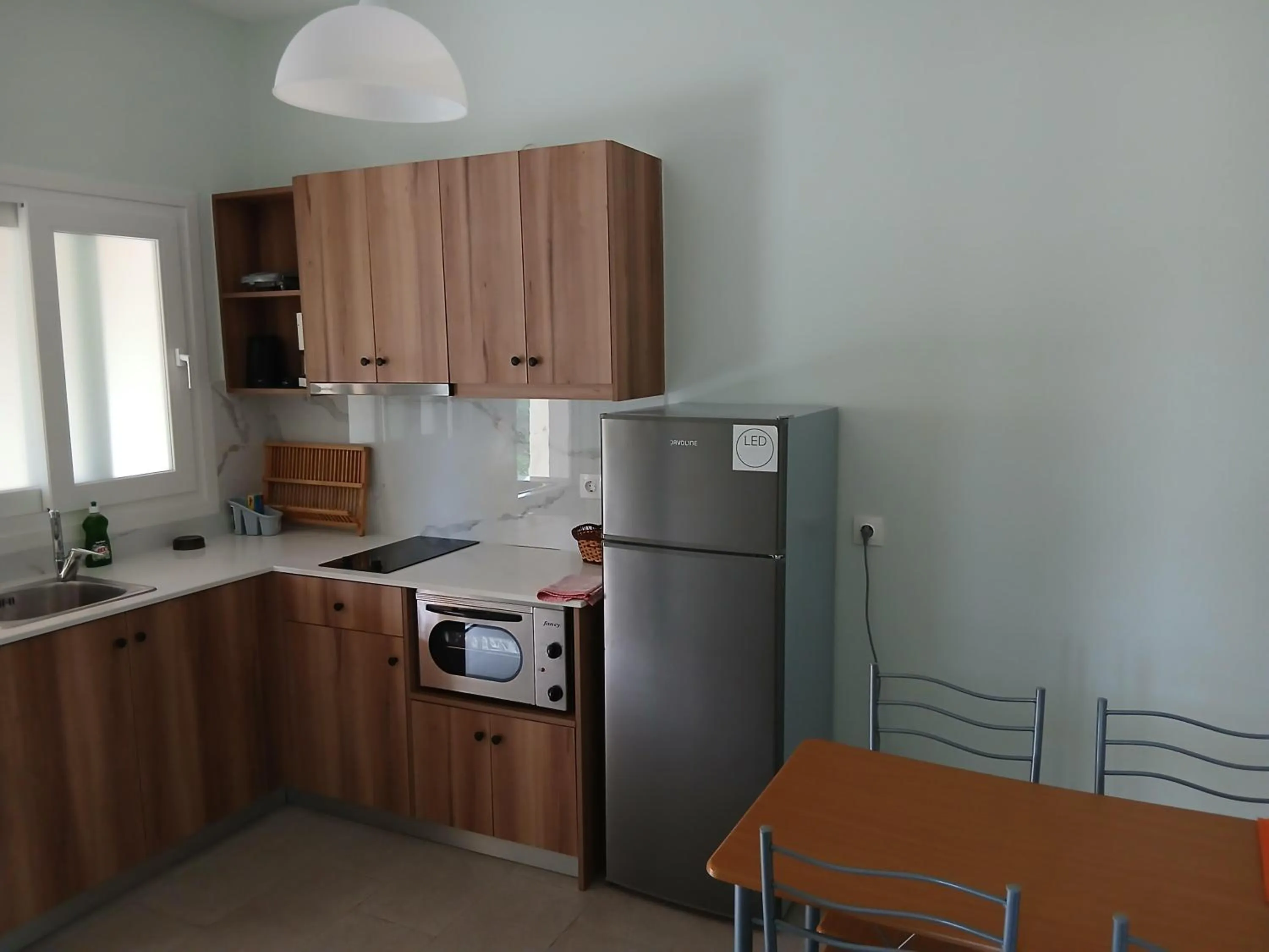 Kitchen or kitchenette in Feeloxenia Corfu Apartments