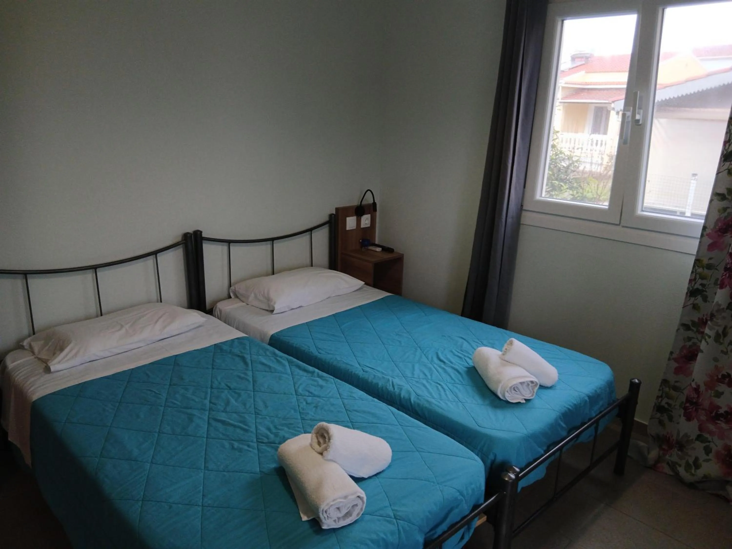 Bed in Feeloxenia Corfu Apartments