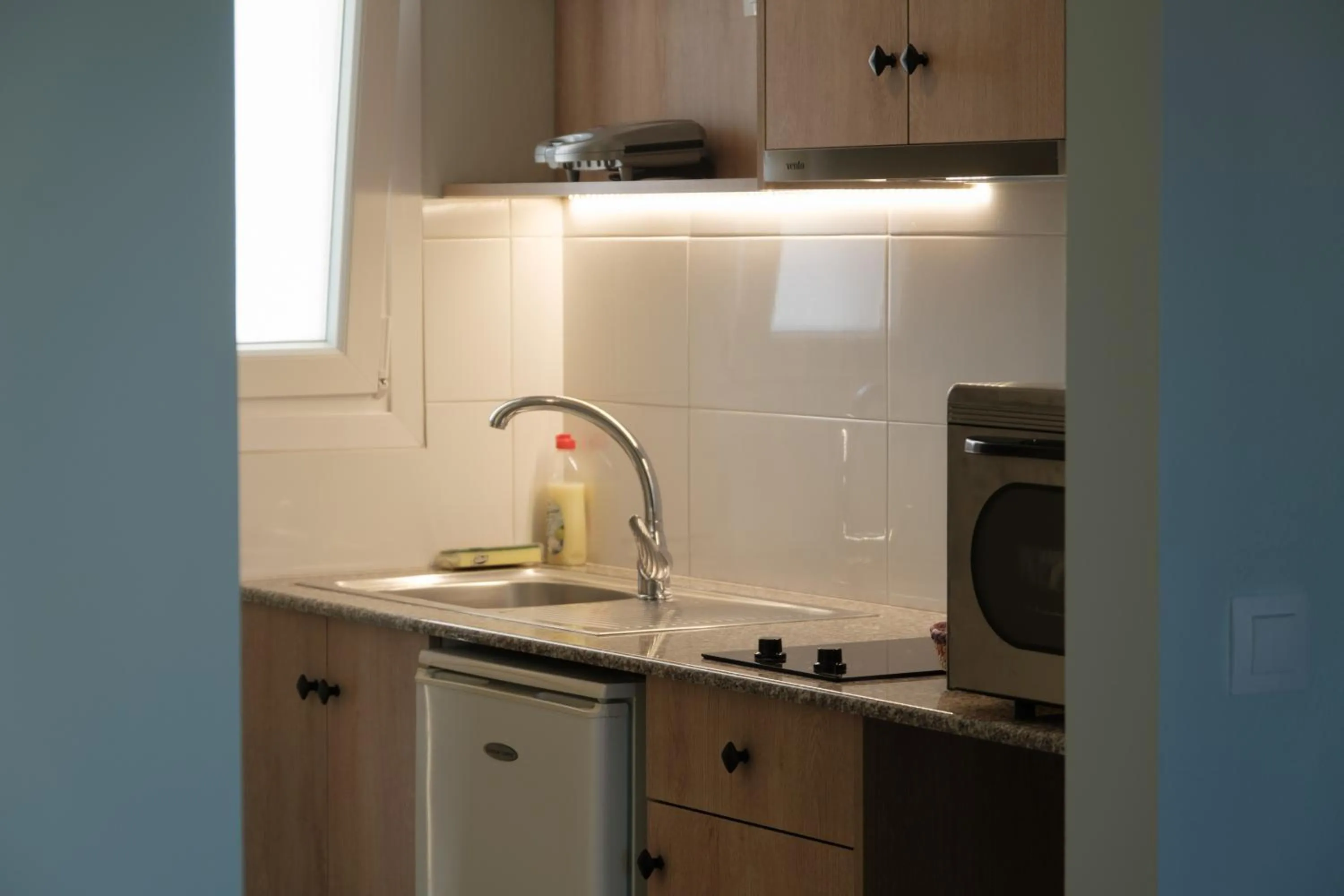 Kitchen or kitchenette in Feeloxenia Corfu Apartments