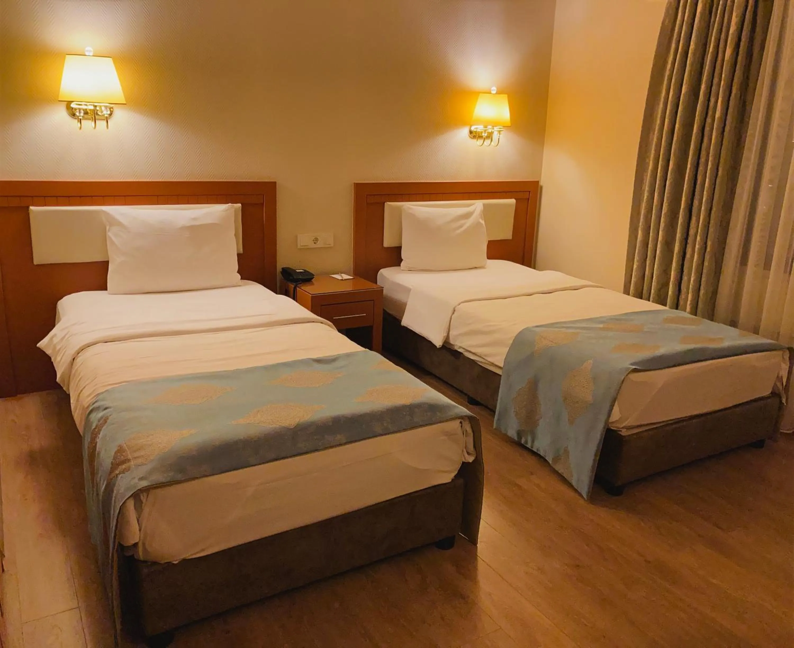 Bed in Premier Vista Hotel