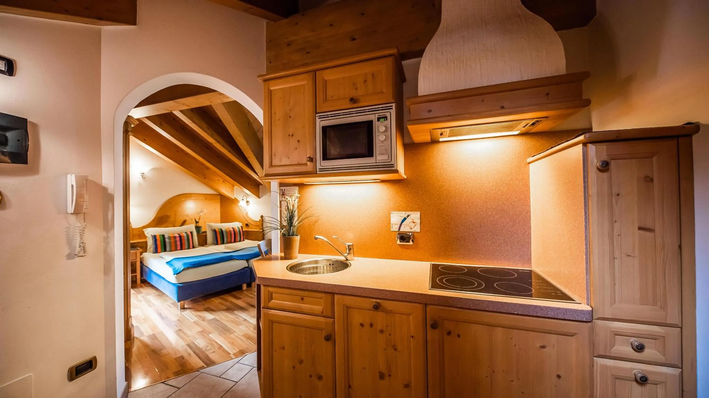 Kitchen or kitchenette, Bed in Chalet Mottolino