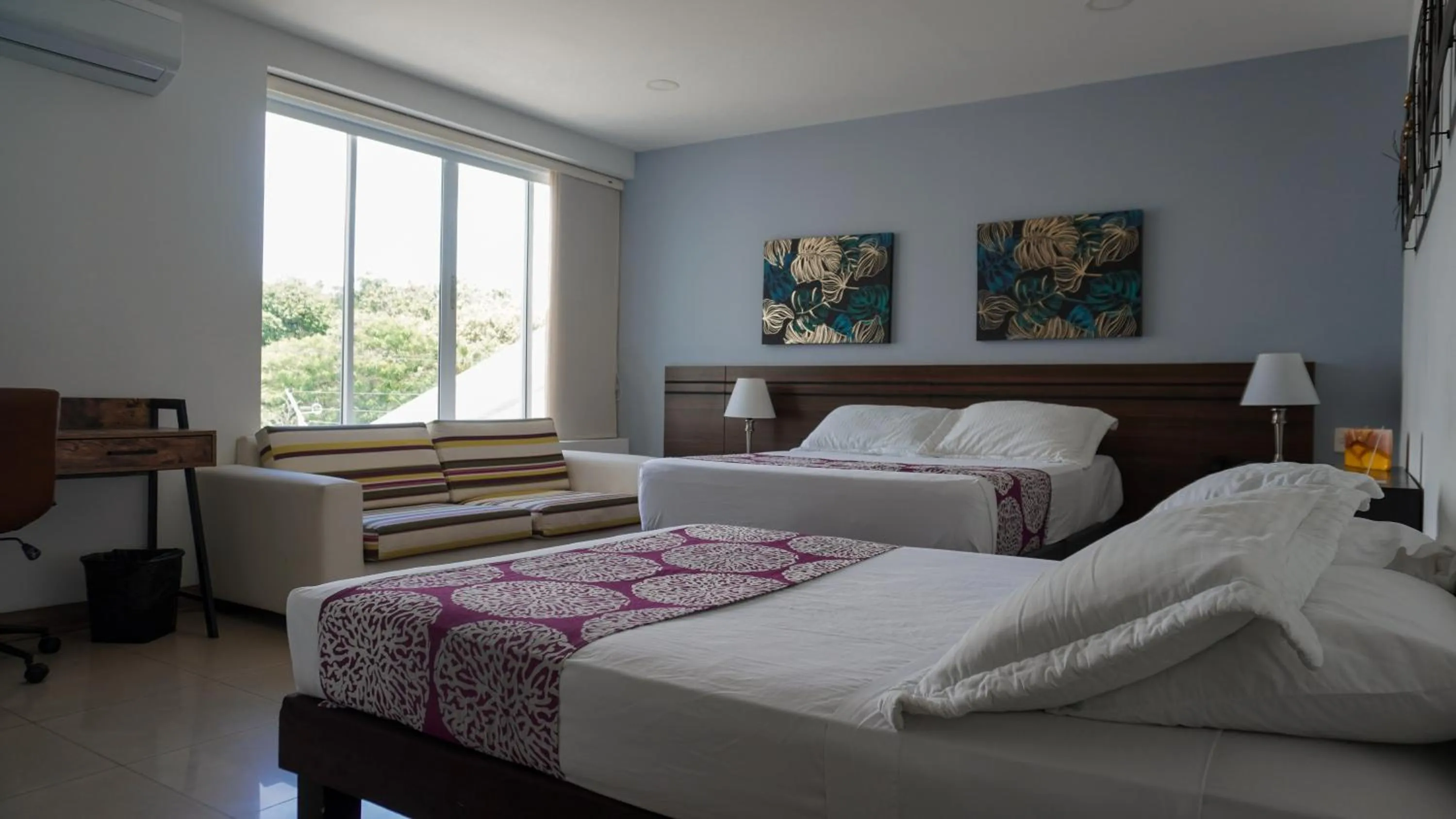 Bed in Malik Hotel Boutique