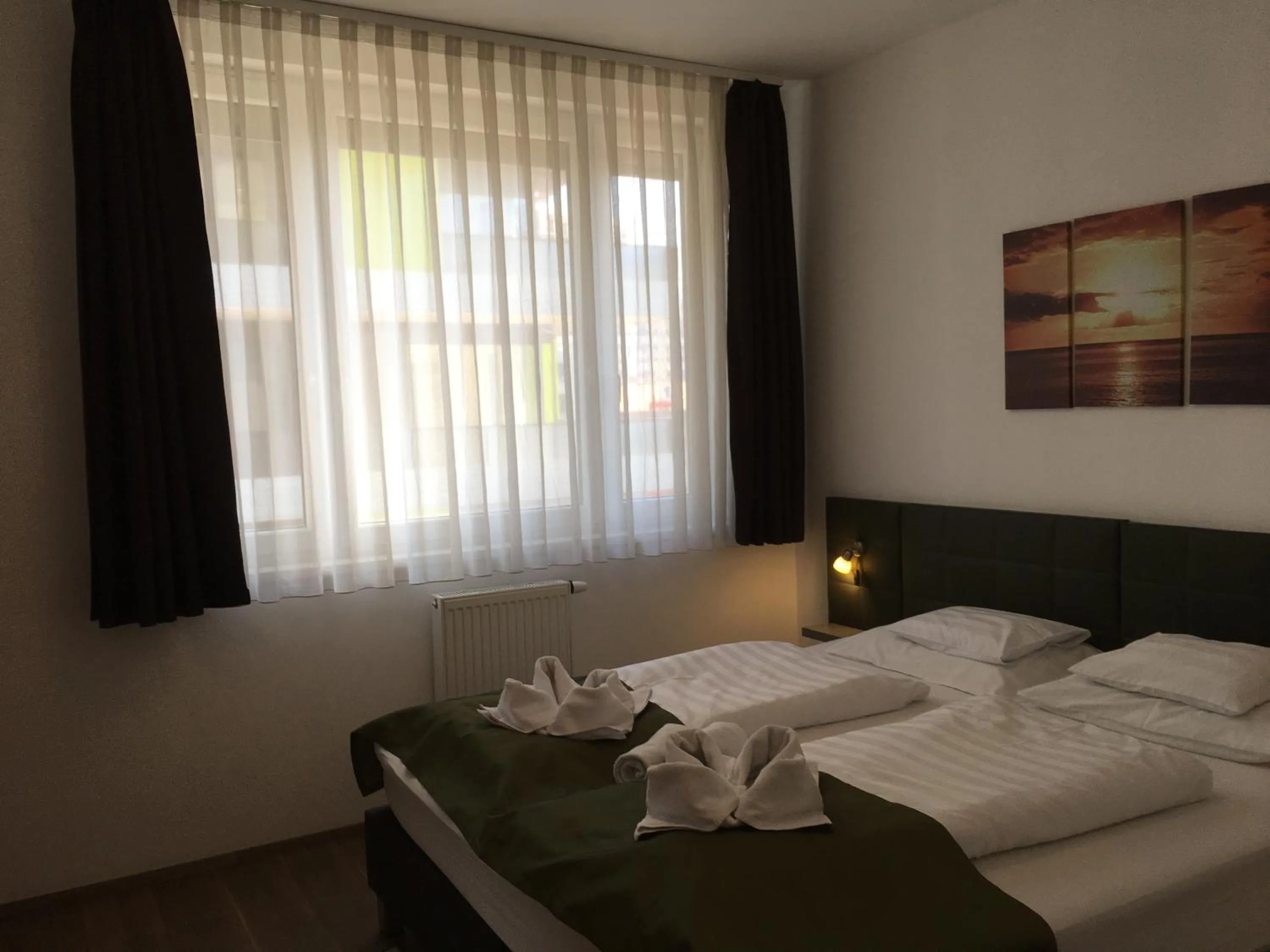 Photo of the whole room, Bed in Corvin Residence Apartments