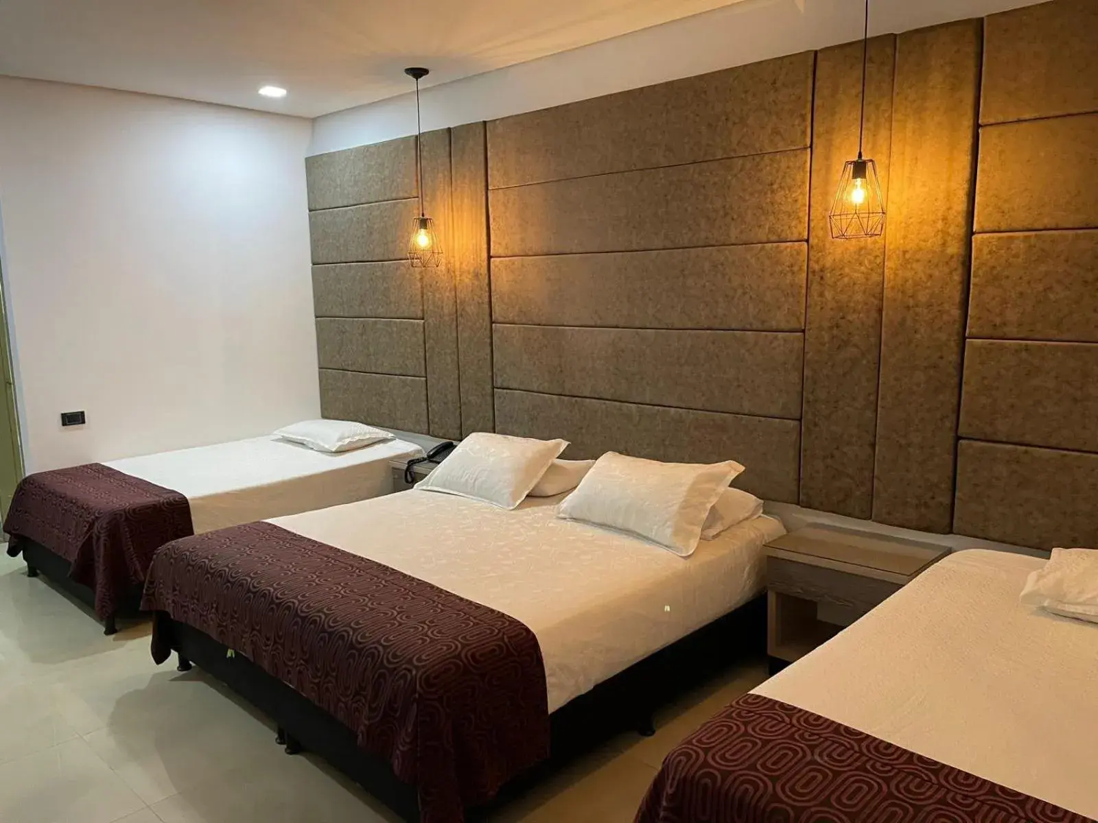 Classic Quadruple Room in Hotel Merlott 70 Classic Quadruple Room in Hotel Merlott 70