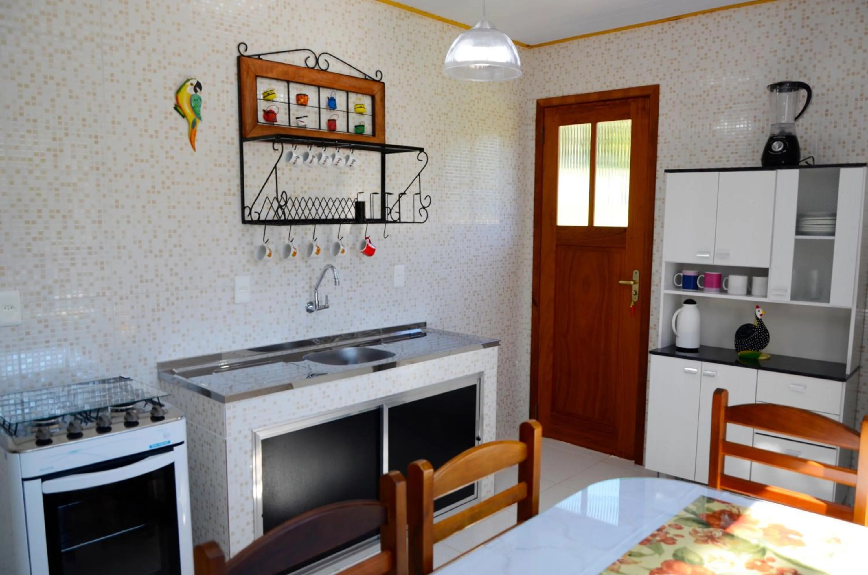 Kitchen or kitchenette in Pousada Sabor da Serra