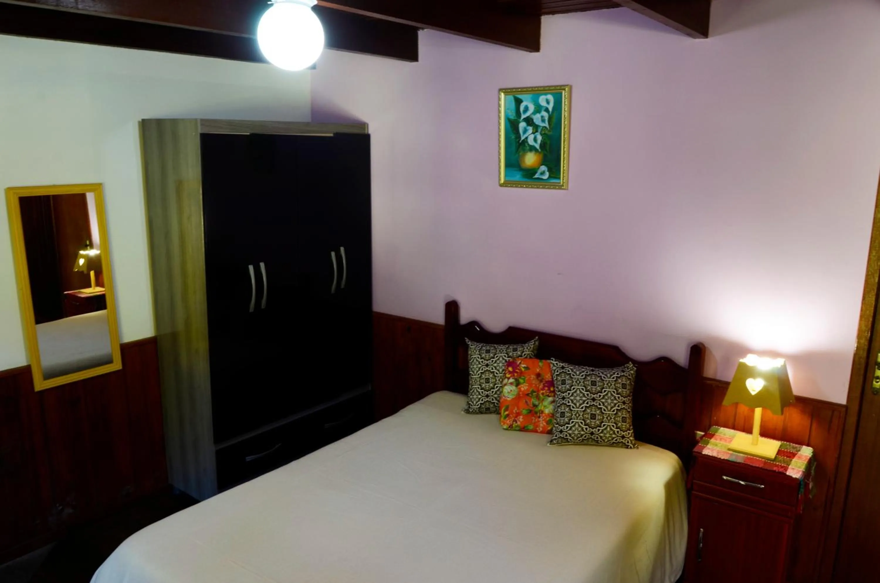 Bed in Pousada Sabor da Serra