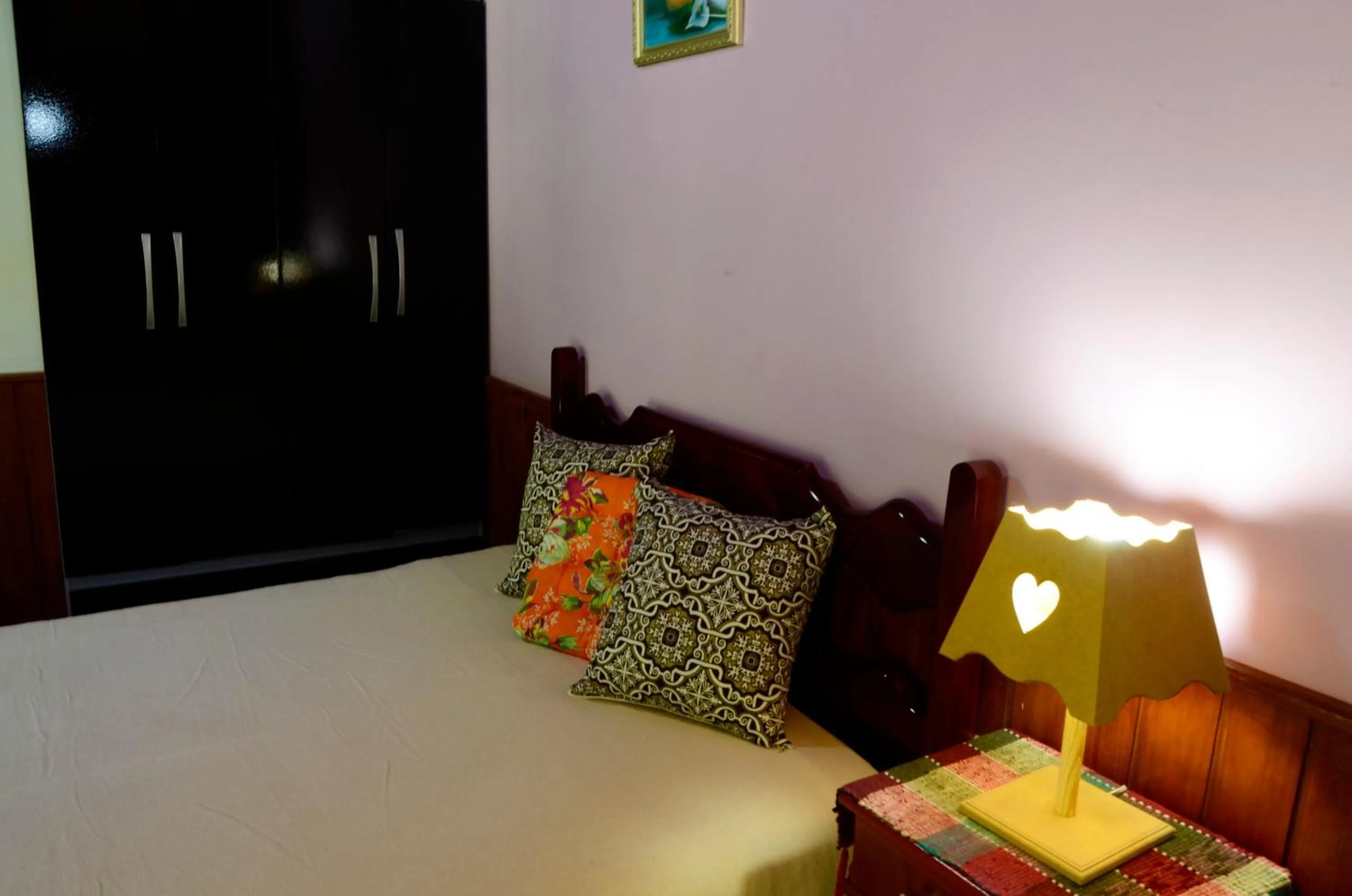 Bed in Pousada Sabor da Serra