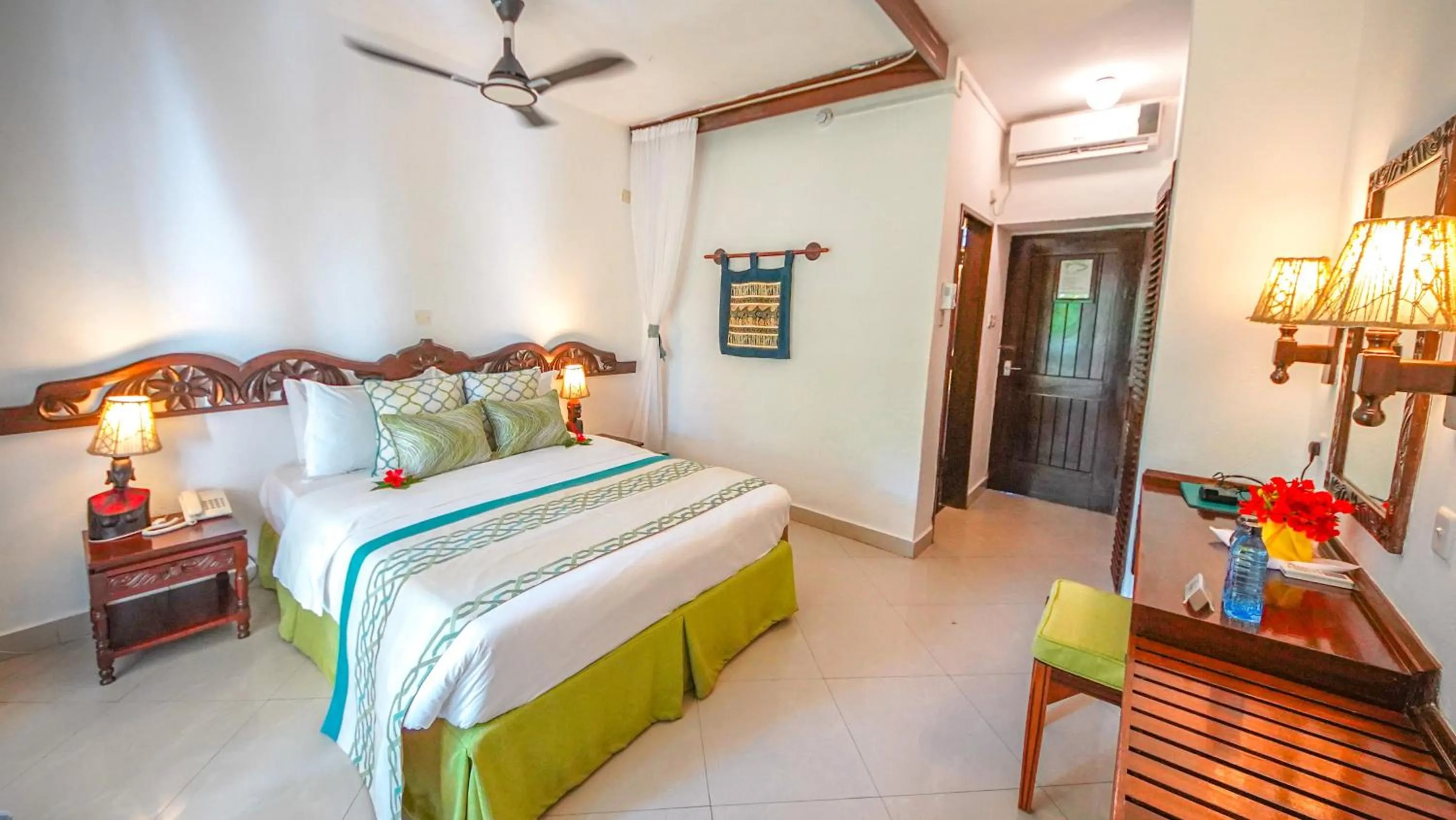 Shower, Bed in Papillon Lagoon Reef Hotel