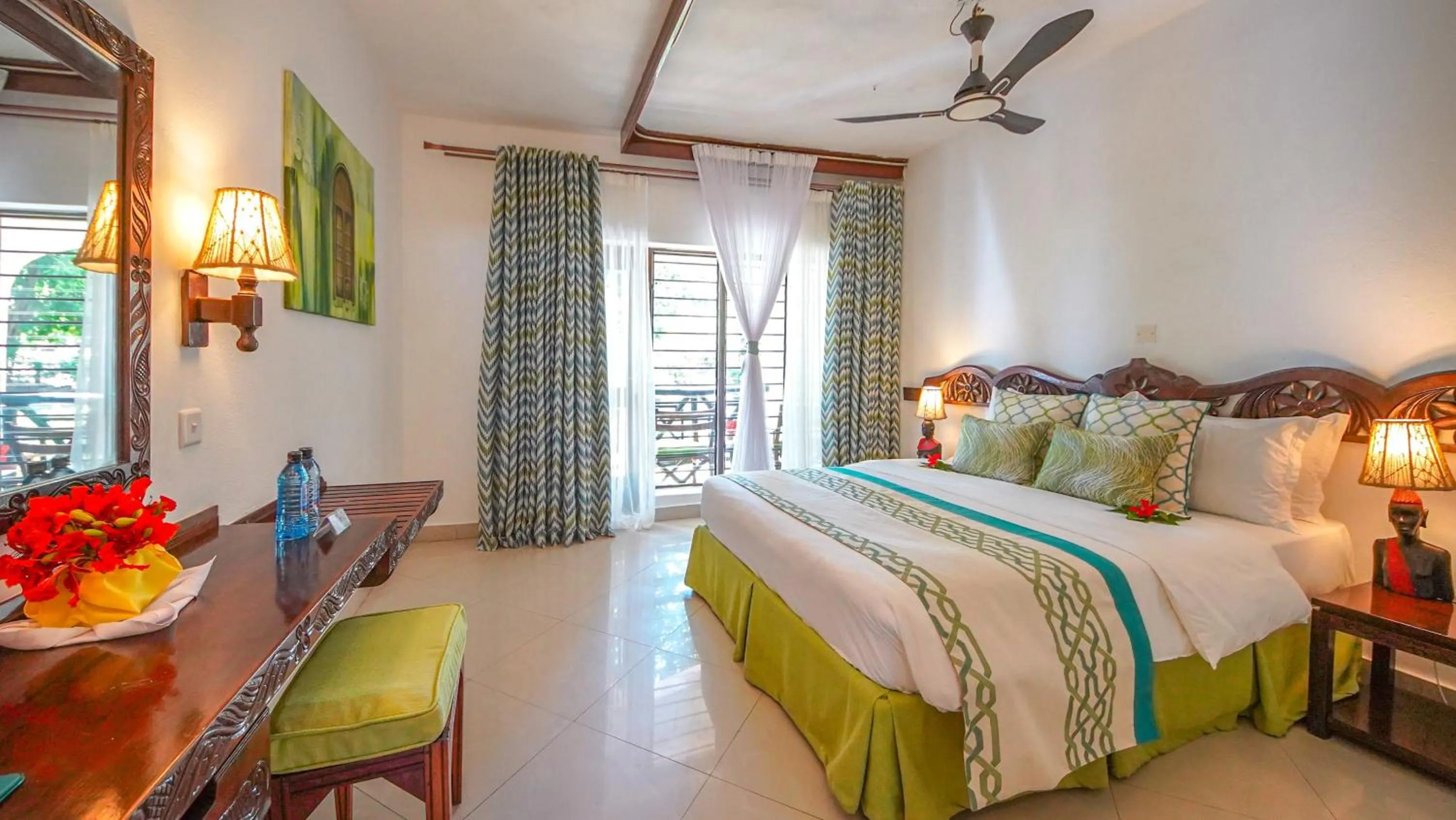 Bed in Papillon Lagoon Reef Hotel