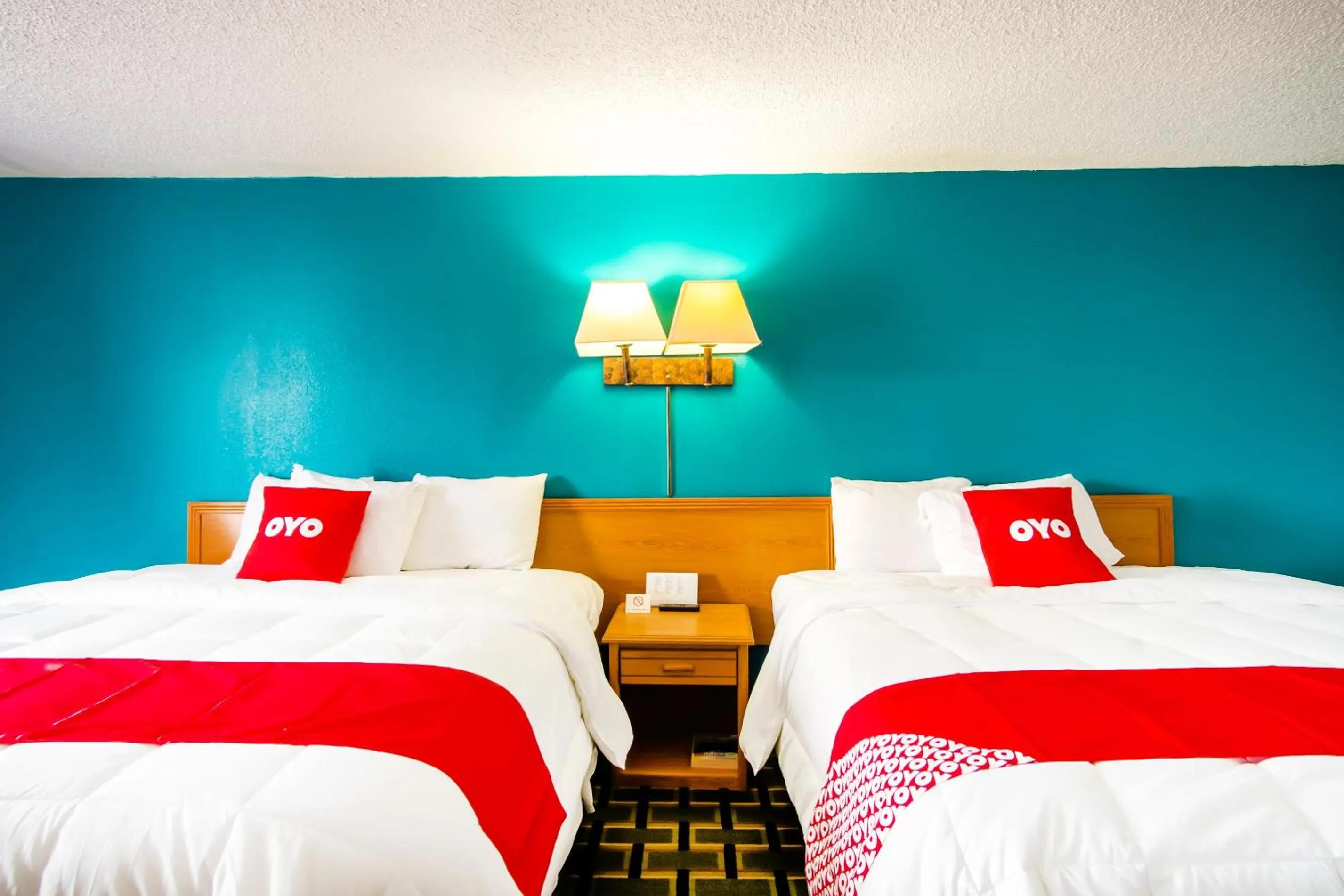 Bedroom, Bed in OYO Hotel Hutchinson West 4th Ave