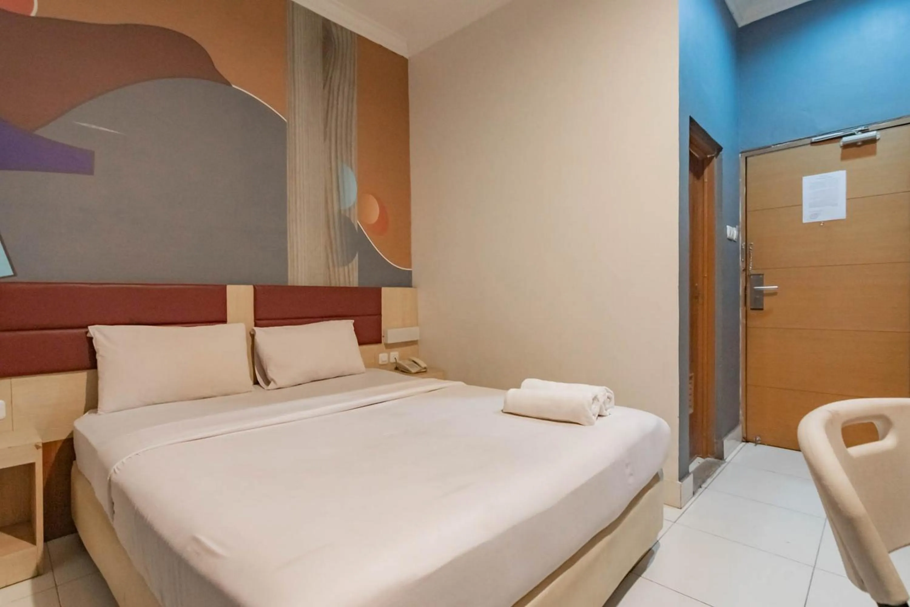 Bed in RedDoorz At Hotel Arimbi Dewi Sartika Baru