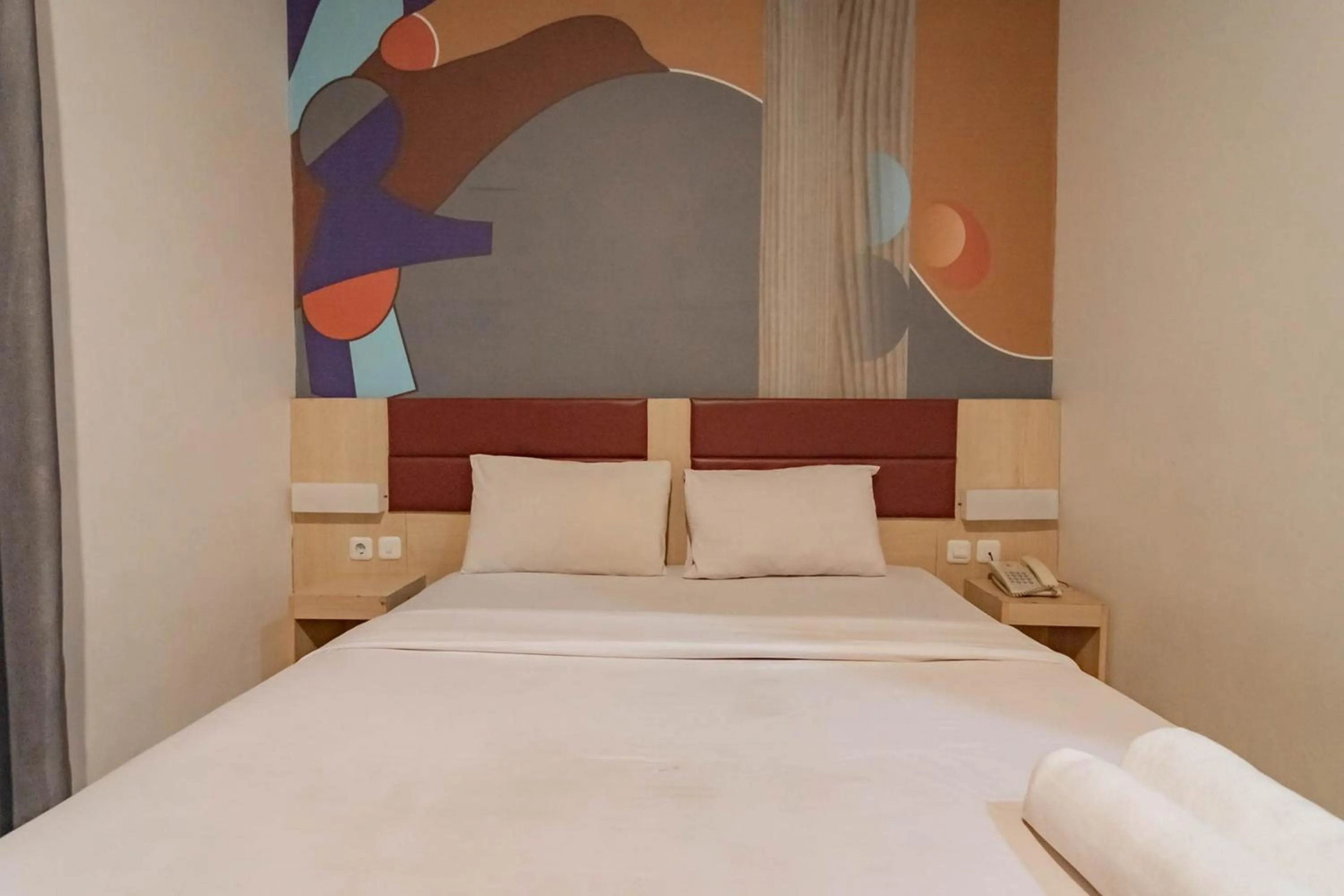 Bed in RedDoorz At Hotel Arimbi Dewi Sartika Baru