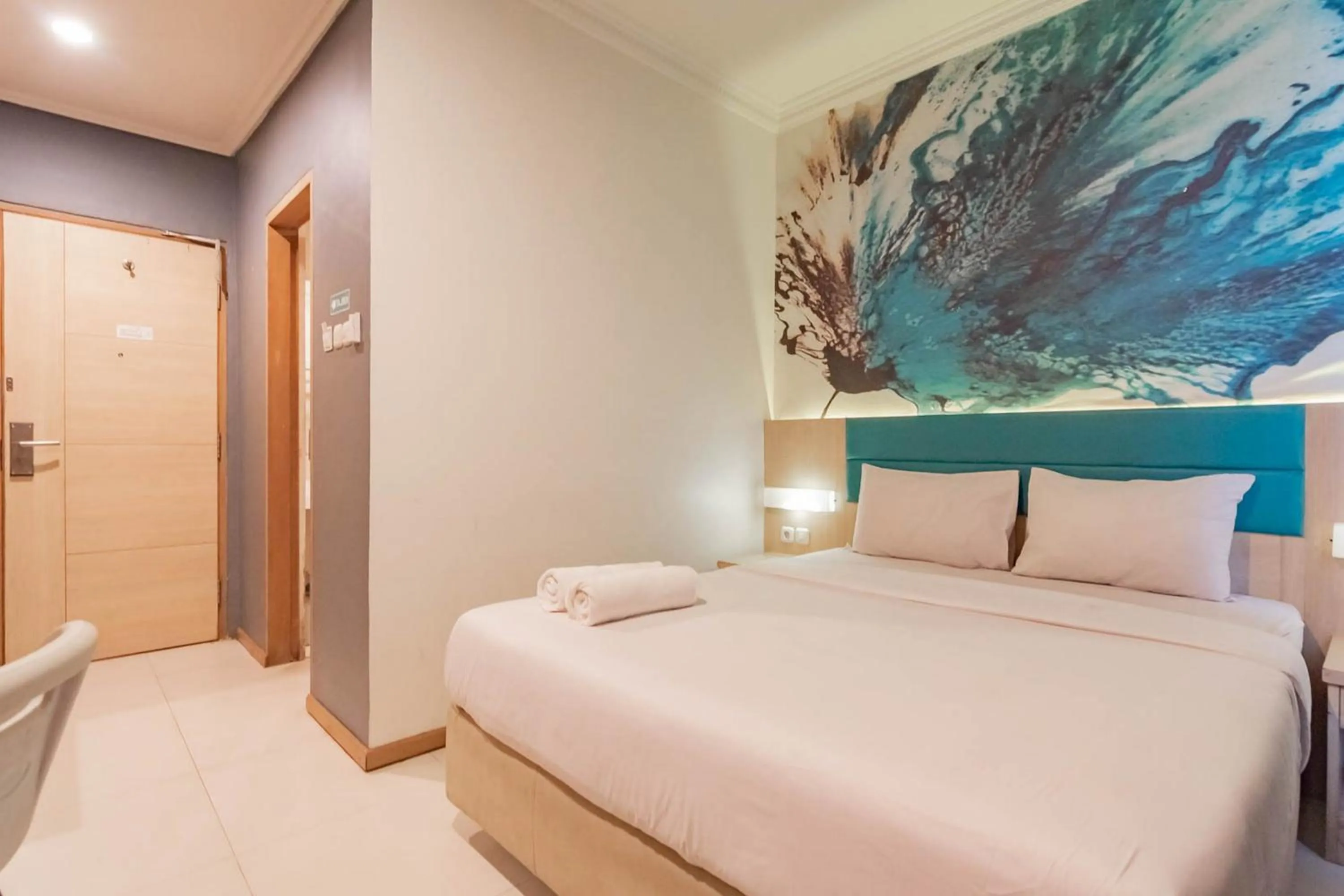 Bed in RedDoorz At Hotel Arimbi Dewi Sartika Baru