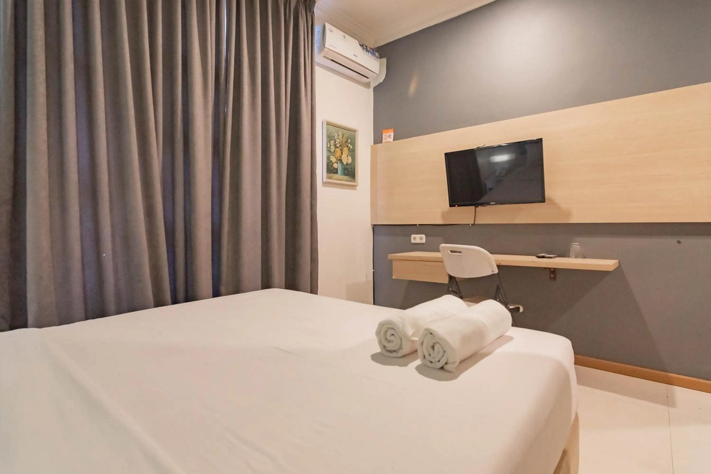 Bed in RedDoorz At Hotel Arimbi Dewi Sartika Baru