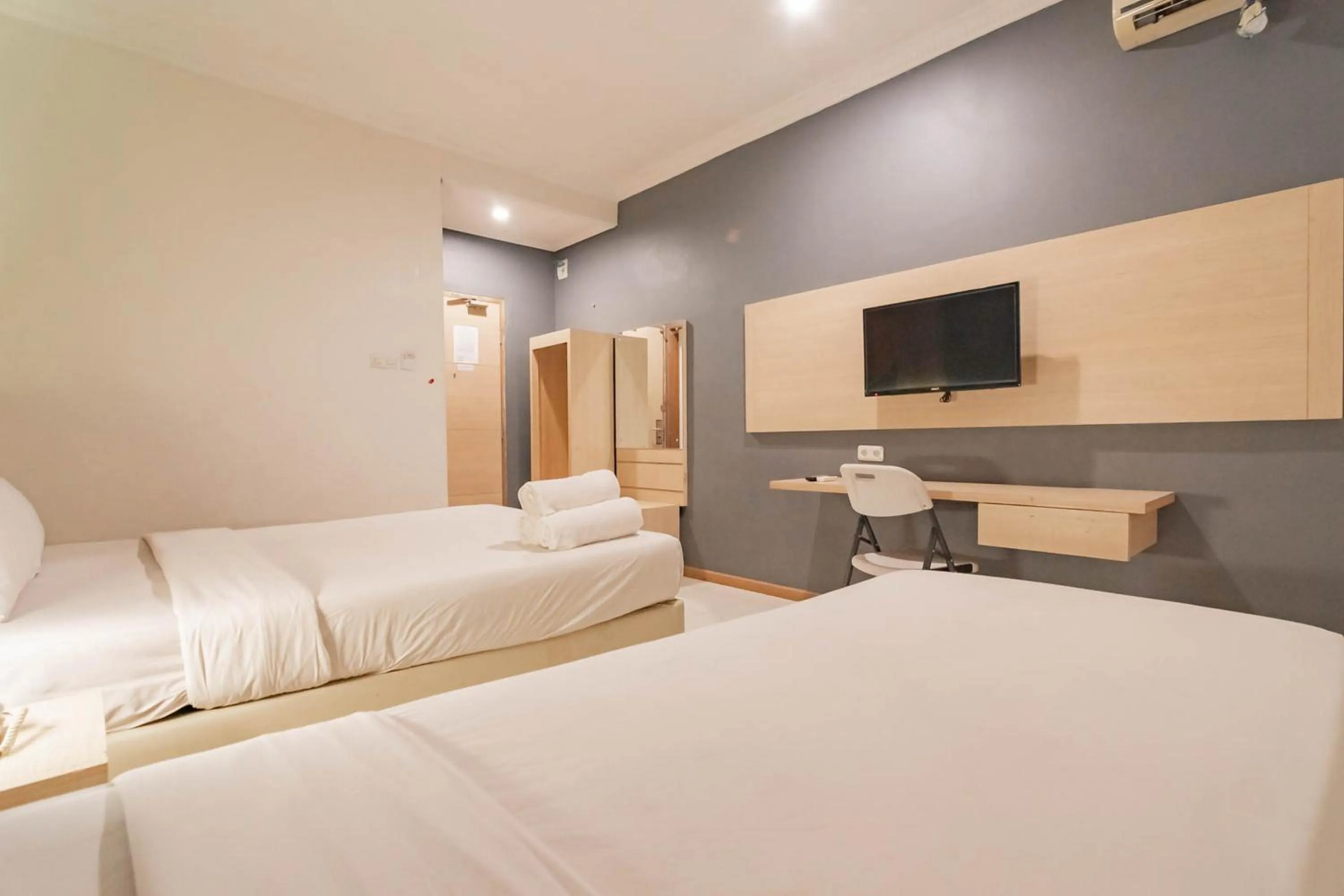 Bed in RedDoorz At Hotel Arimbi Dewi Sartika Baru