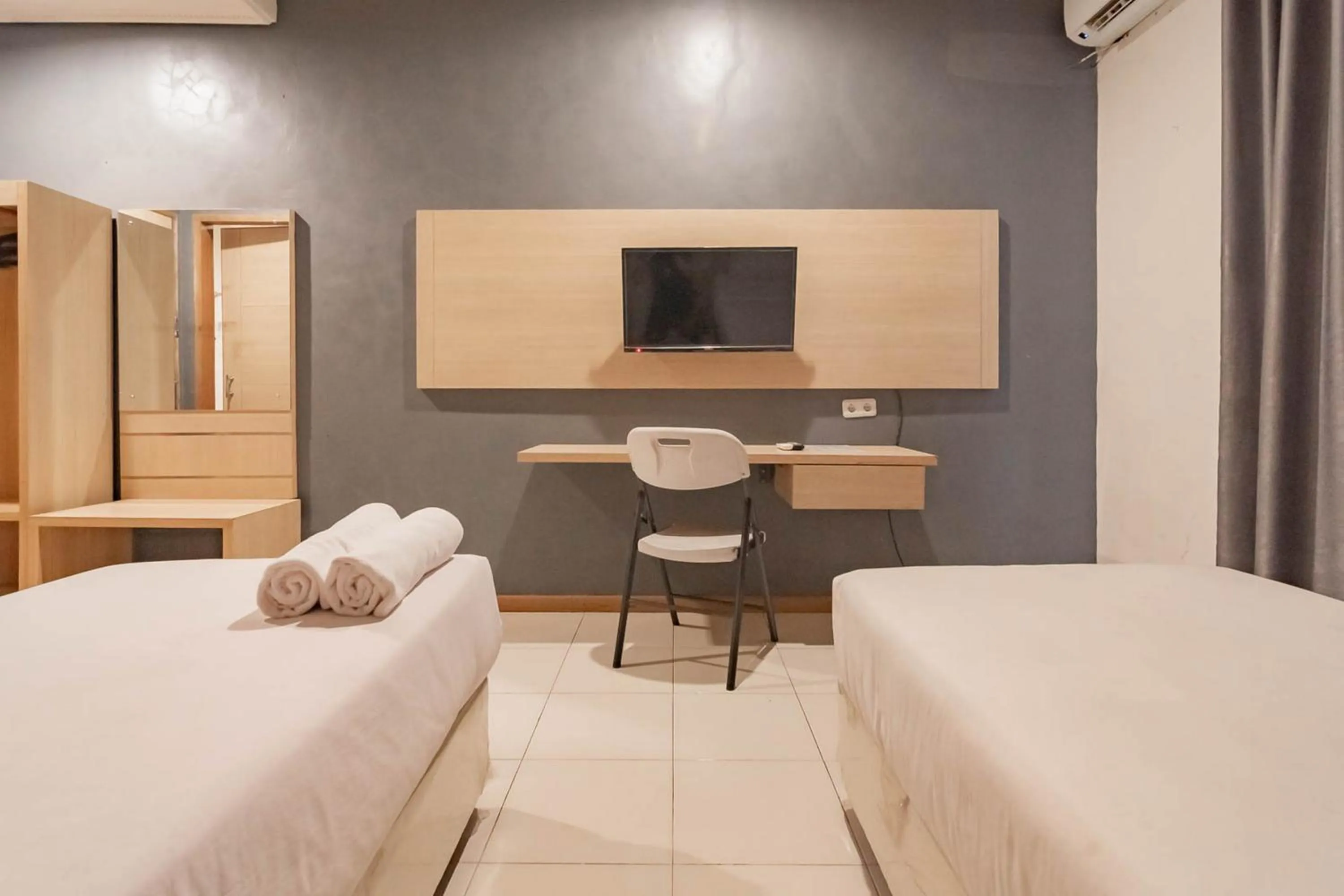 Bed in RedDoorz At Hotel Arimbi Dewi Sartika Baru