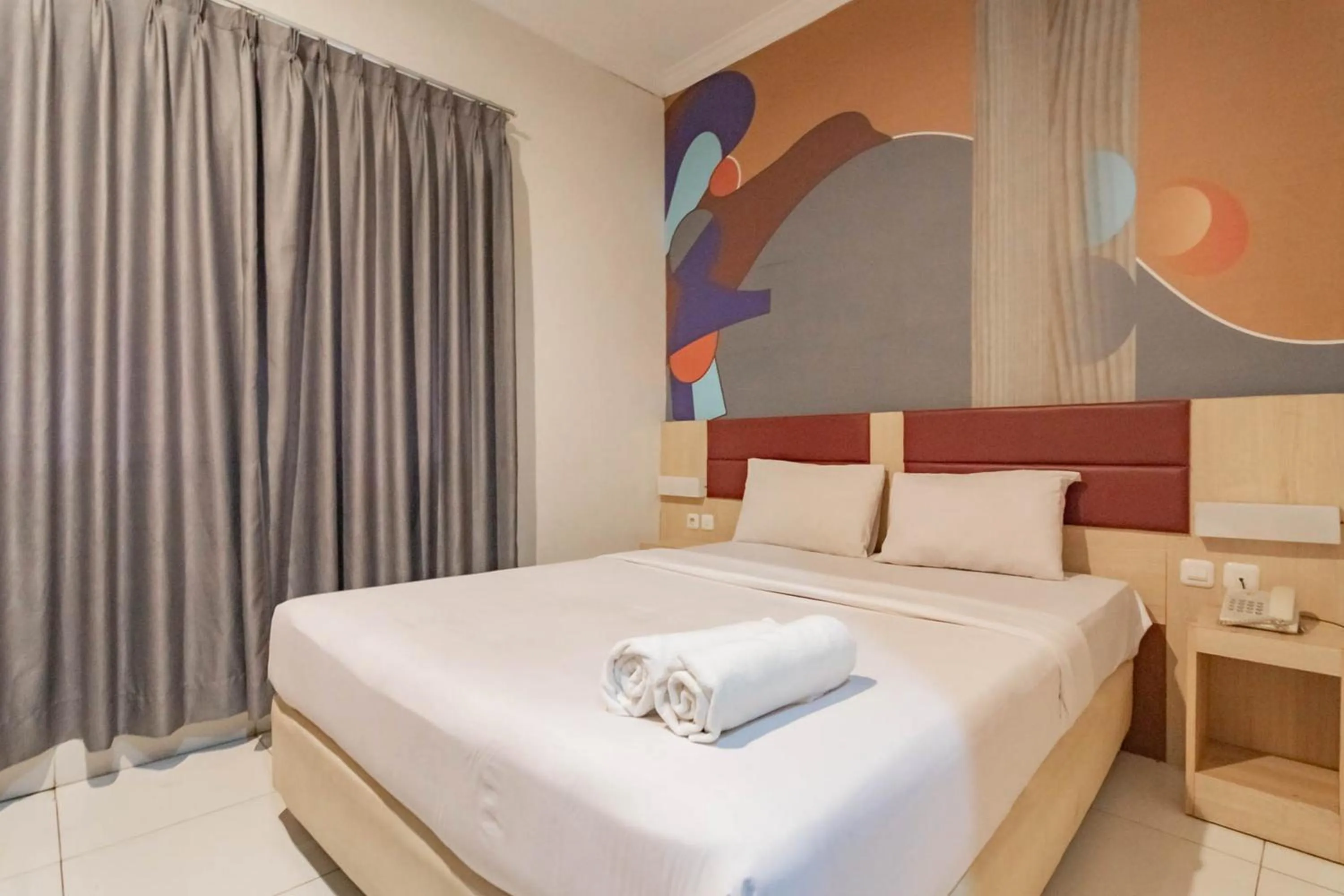 Bed in RedDoorz At Hotel Arimbi Dewi Sartika Baru