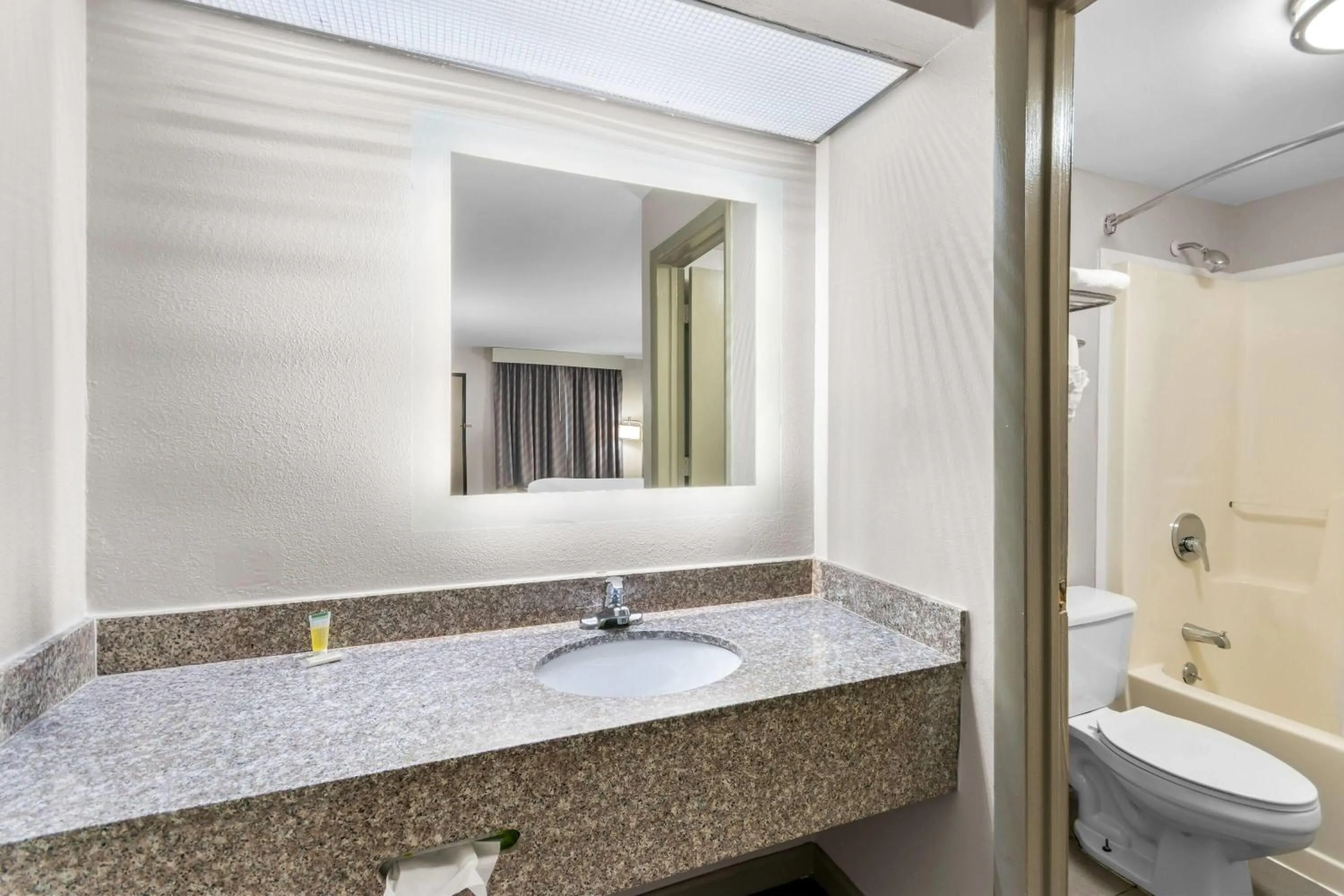 Bathroom in Days Inn by Wyndham Enterprise