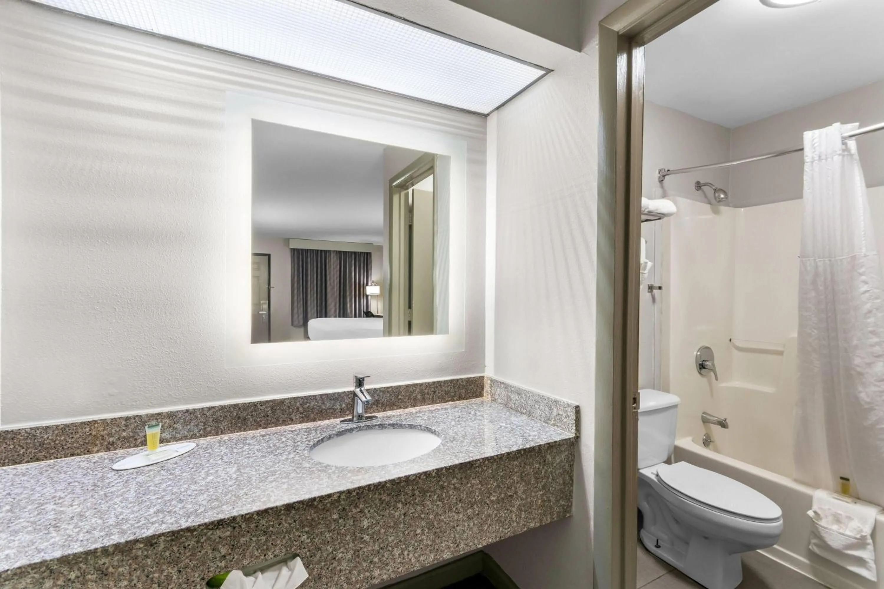 Bathroom in Days Inn by Wyndham Enterprise