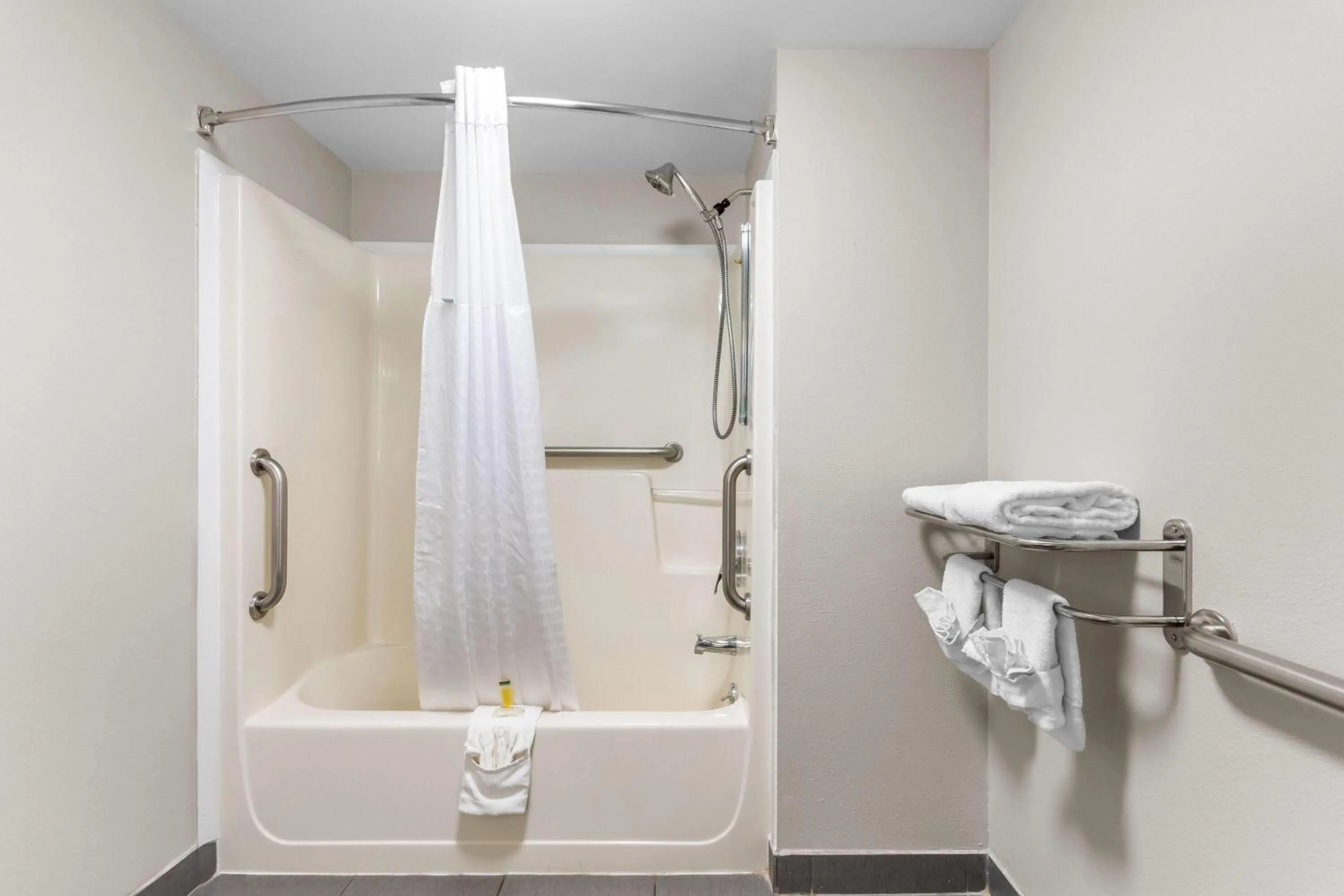 Bathroom in Days Inn by Wyndham Enterprise