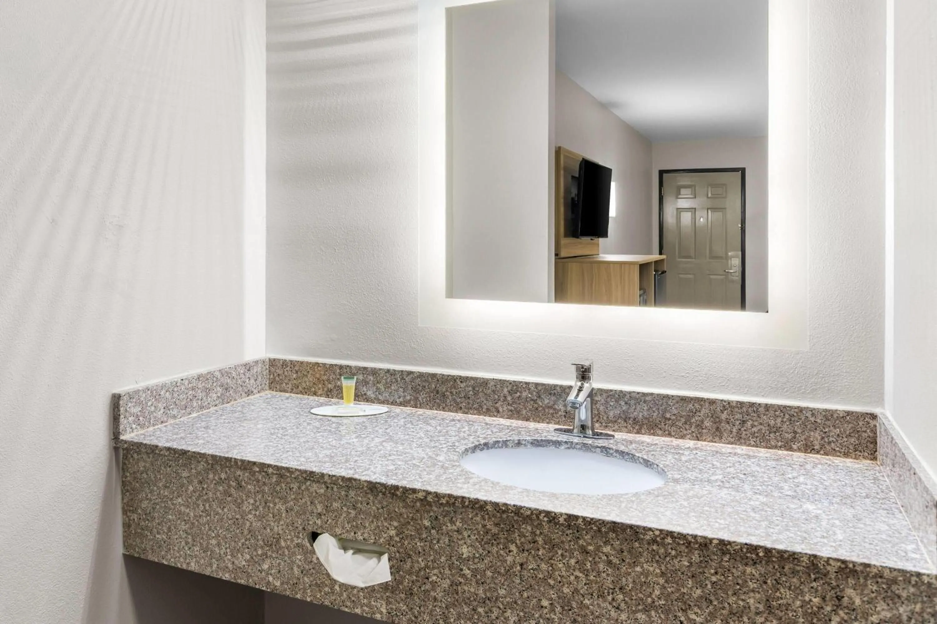 Bathroom in Days Inn by Wyndham Enterprise