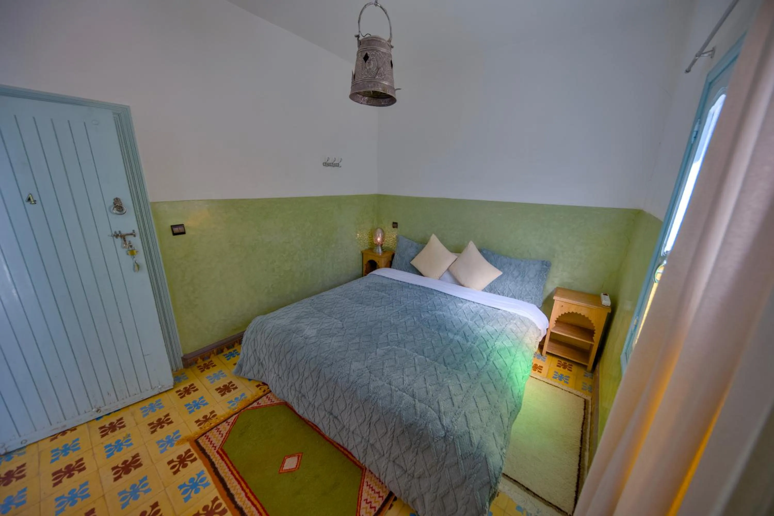 Bed in Maison d'hôtes Dar Farhana