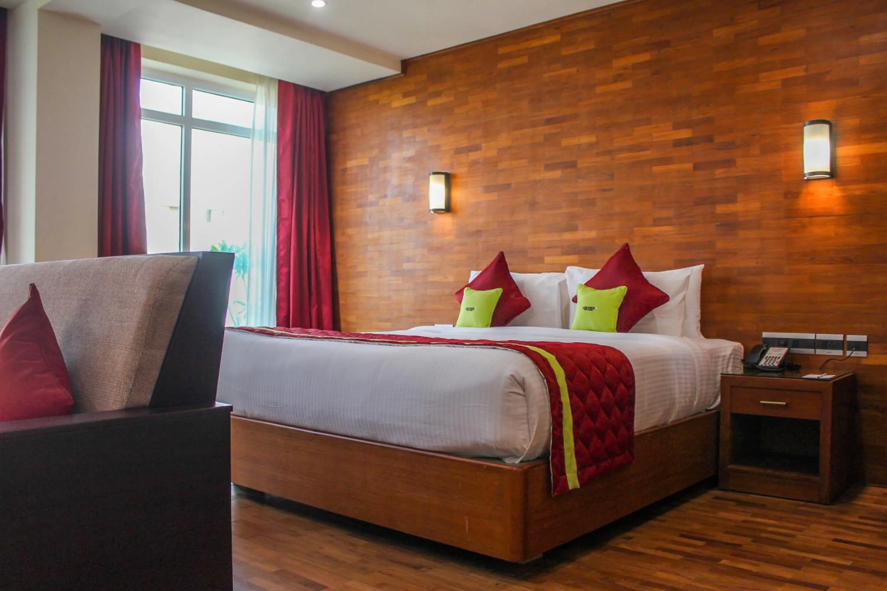 Bedroom, Bed in JVK Park Hotel