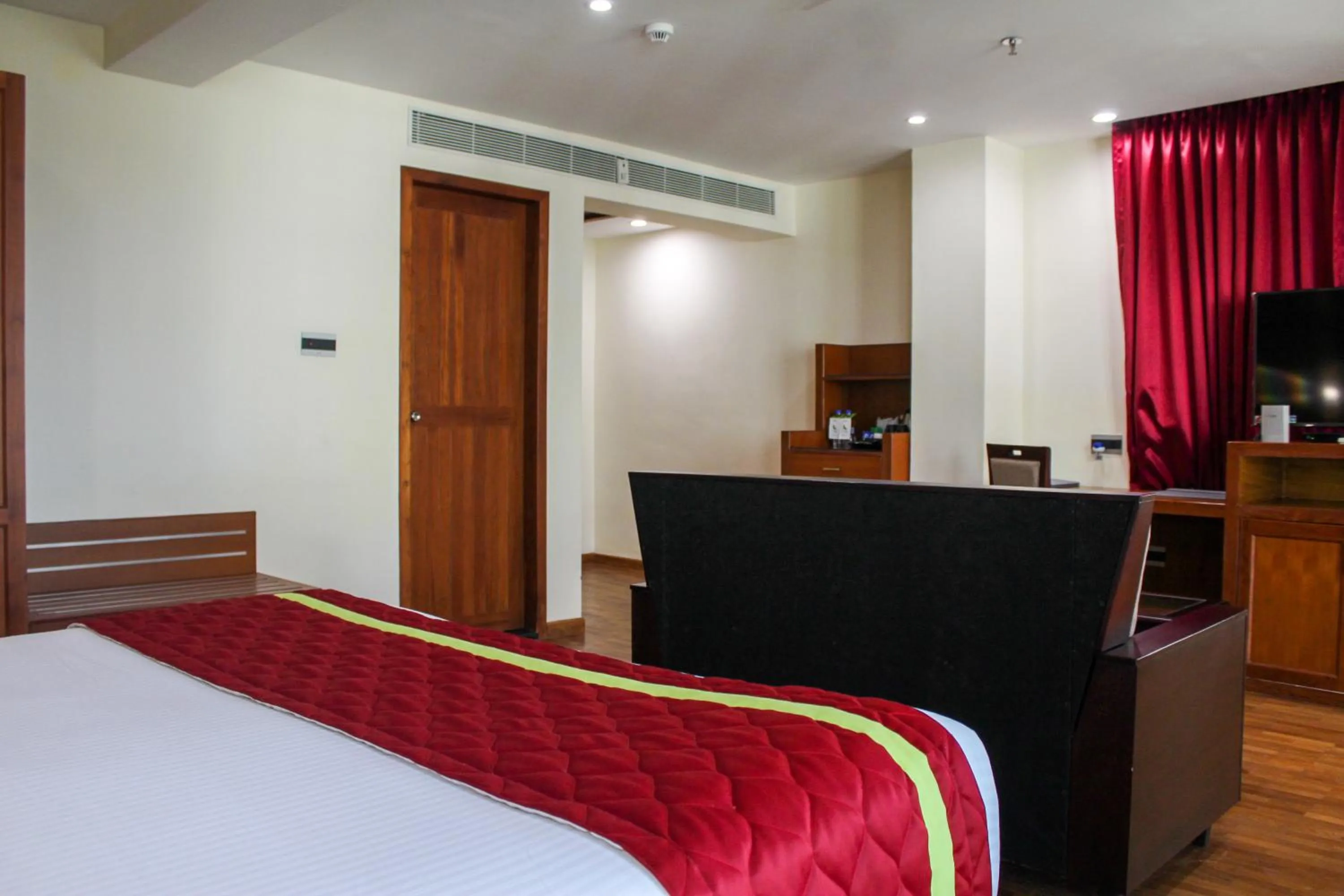 Bedroom, Bed in JVK Park Hotel