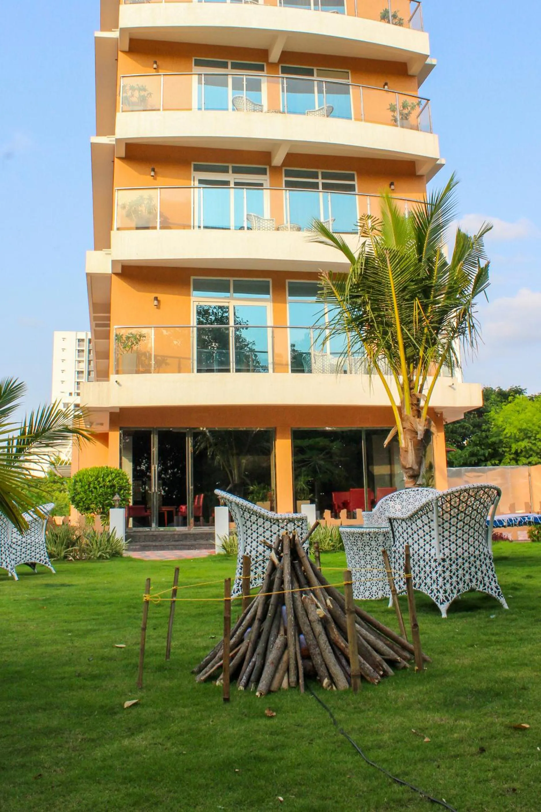 Seating area in JVK Park Hotel