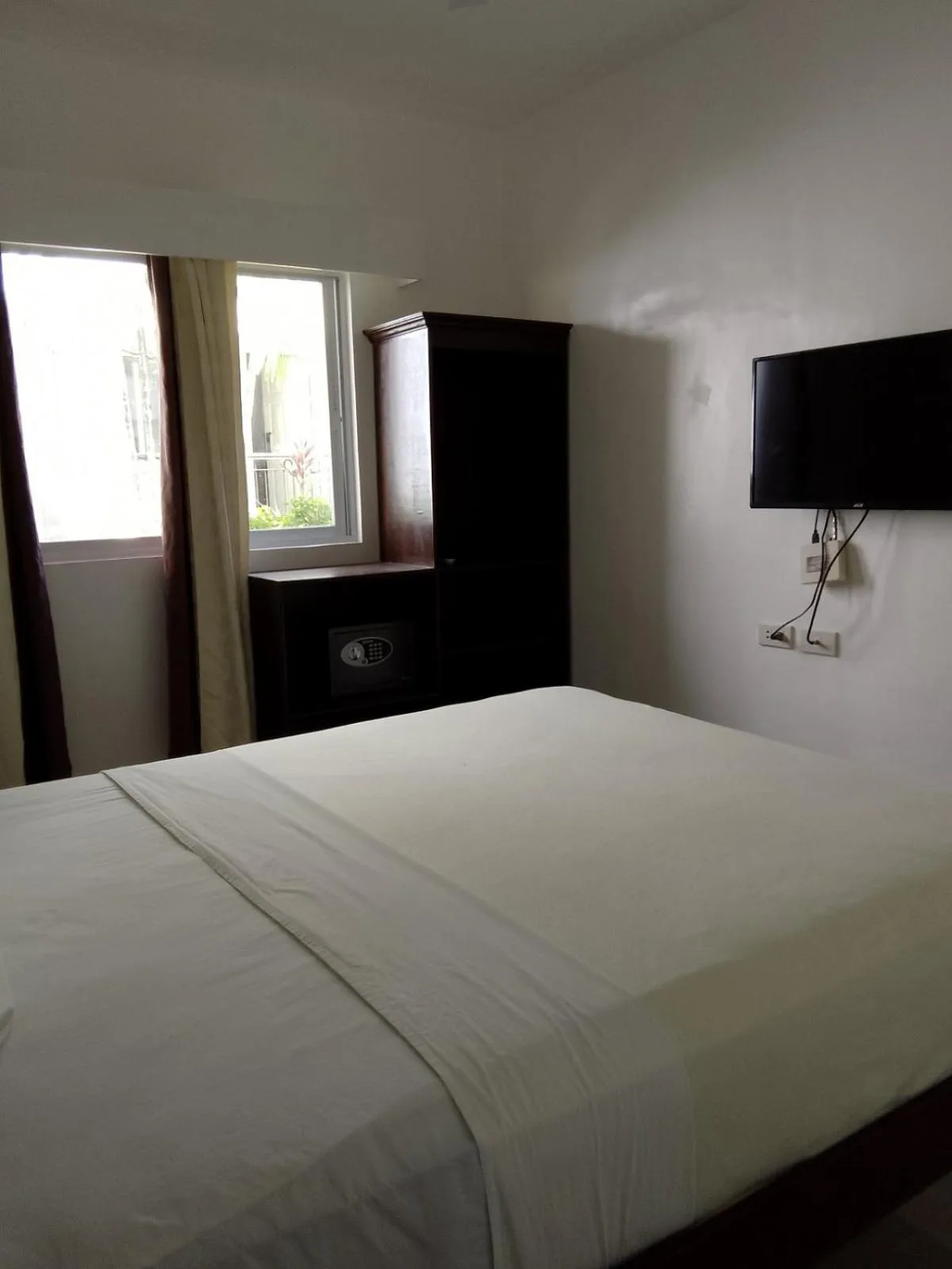 Bed in Heartland Hotel Serviced Rooms & Apartments.