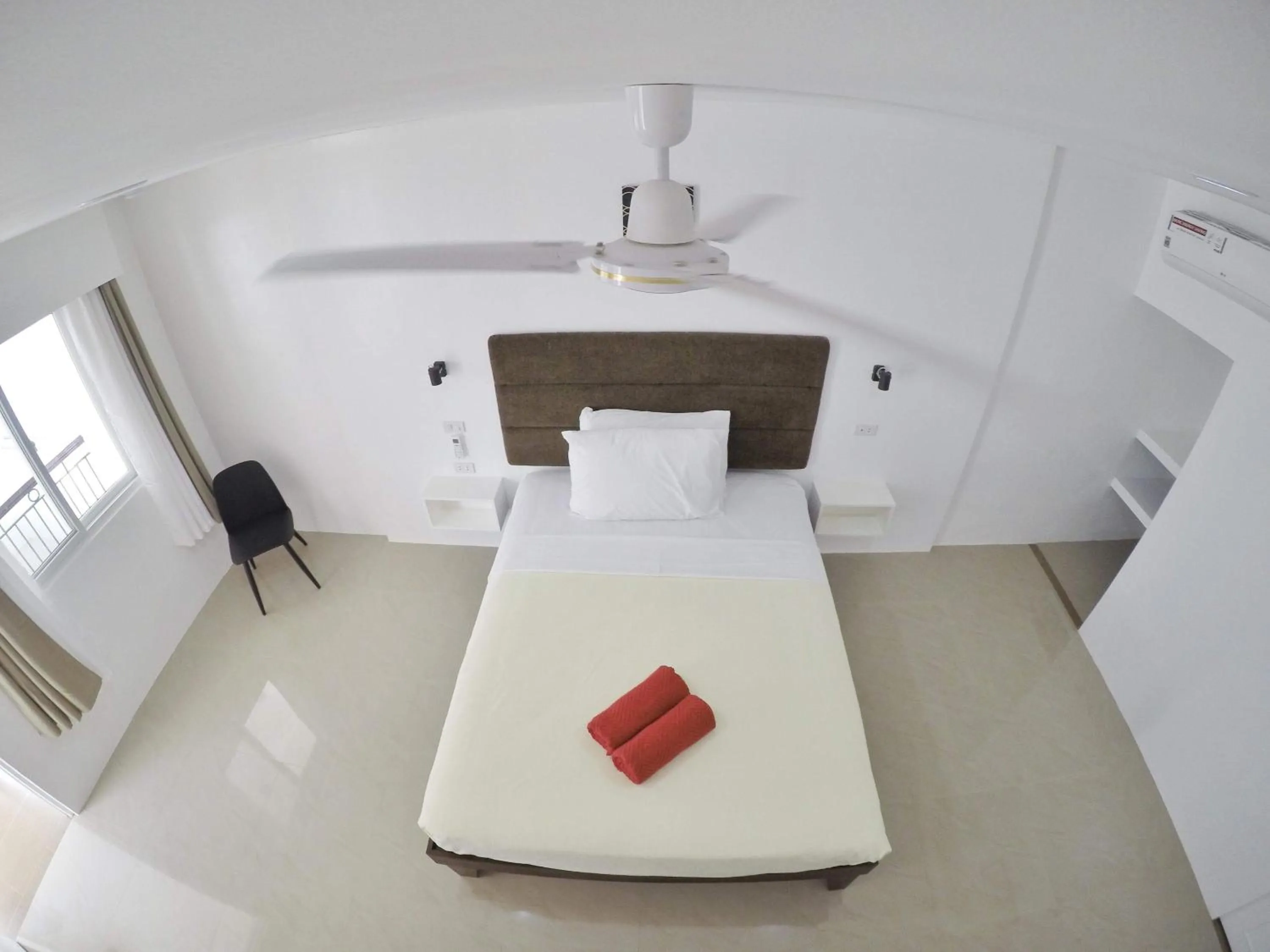 Bed in Heartland Hotel Serviced Rooms & Apartments.