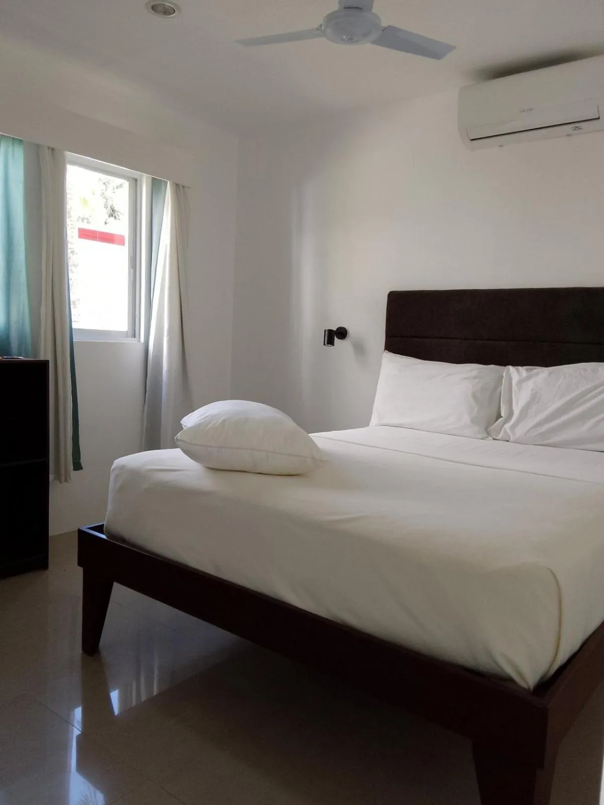 Bed in Heartland Hotel Serviced Rooms & Apartments.