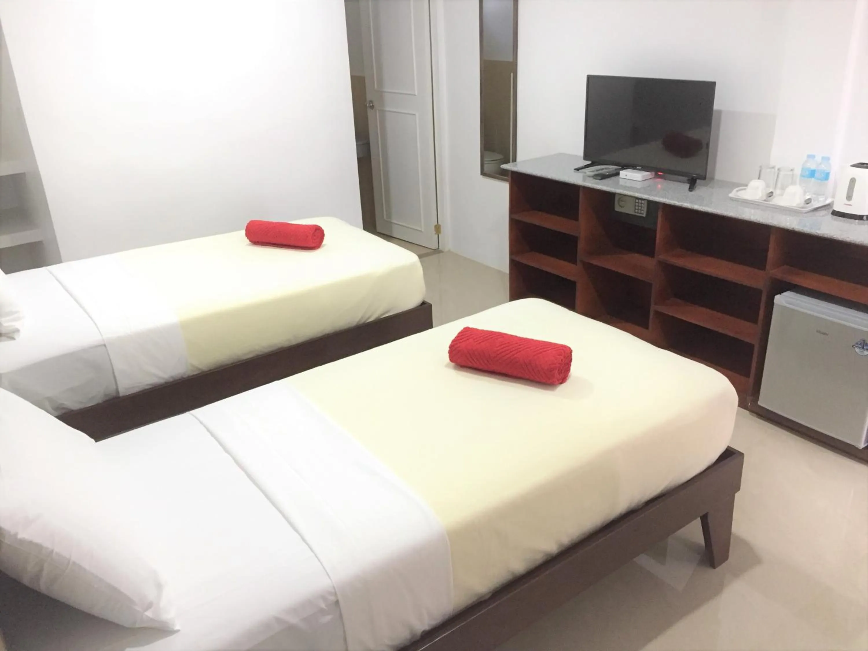 Bed in Heartland Hotel Serviced Rooms & Apartments.