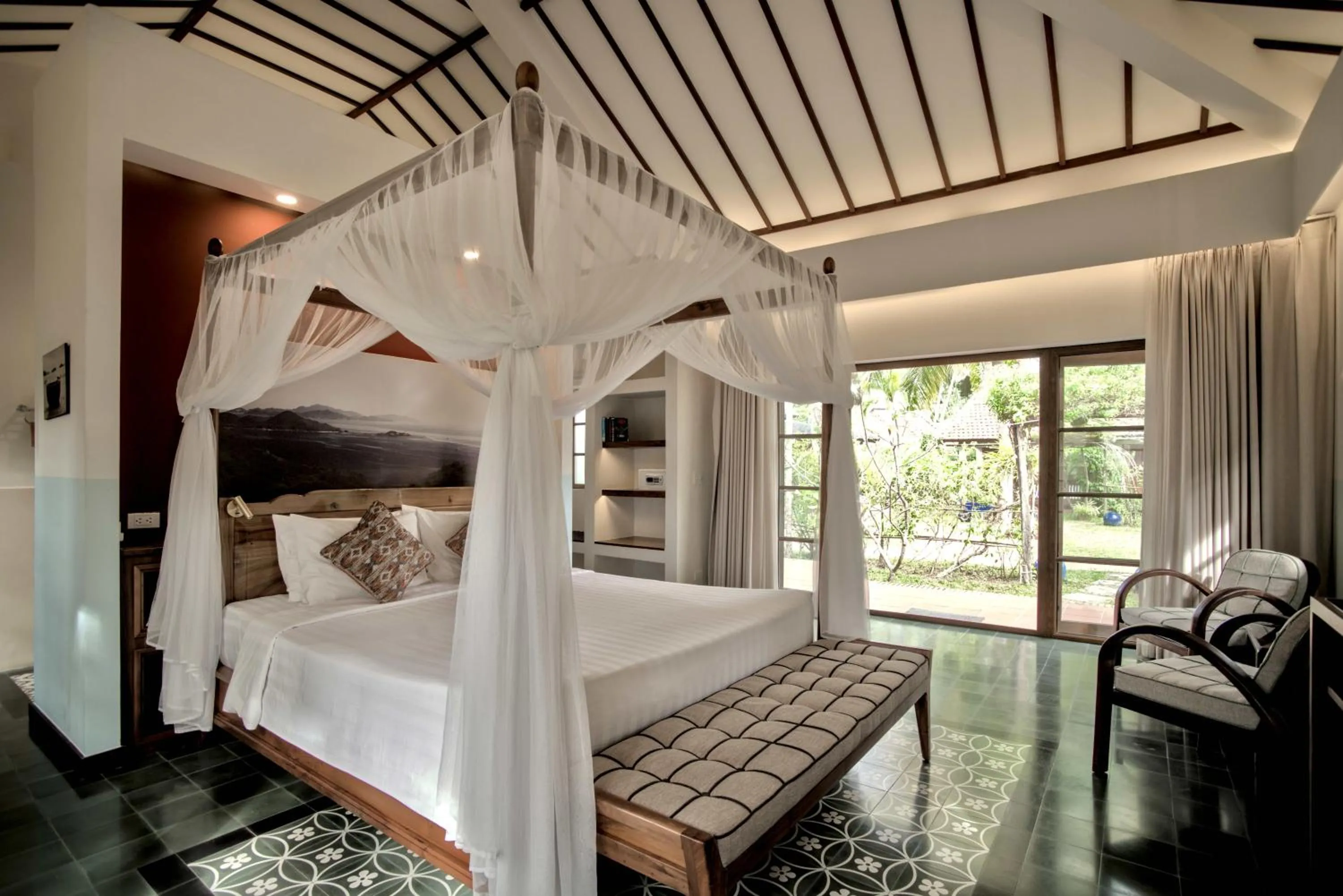 Bed in Cassia Cottage Resort and Spa