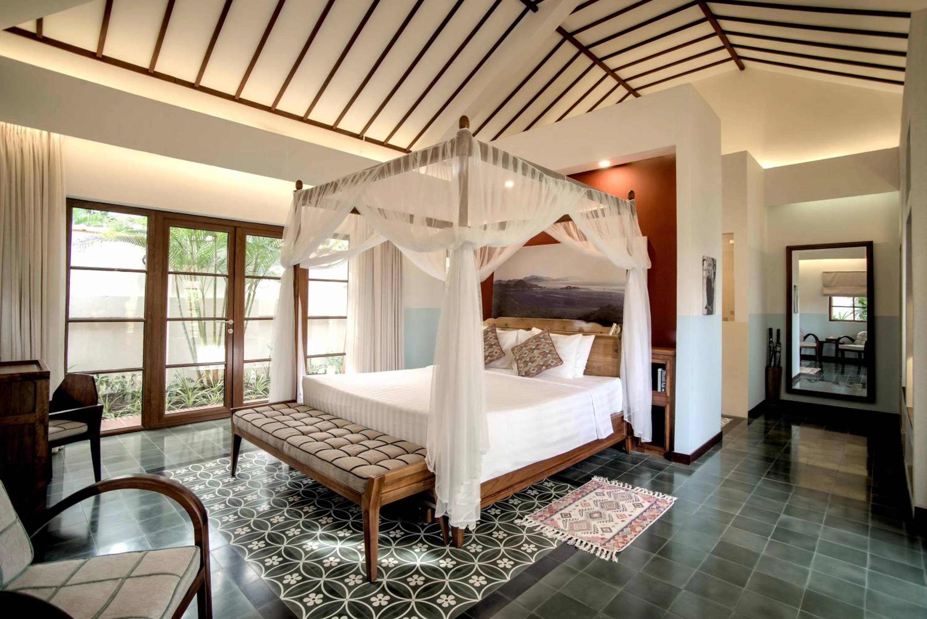 Bed in Cassia Cottage Resort and Spa