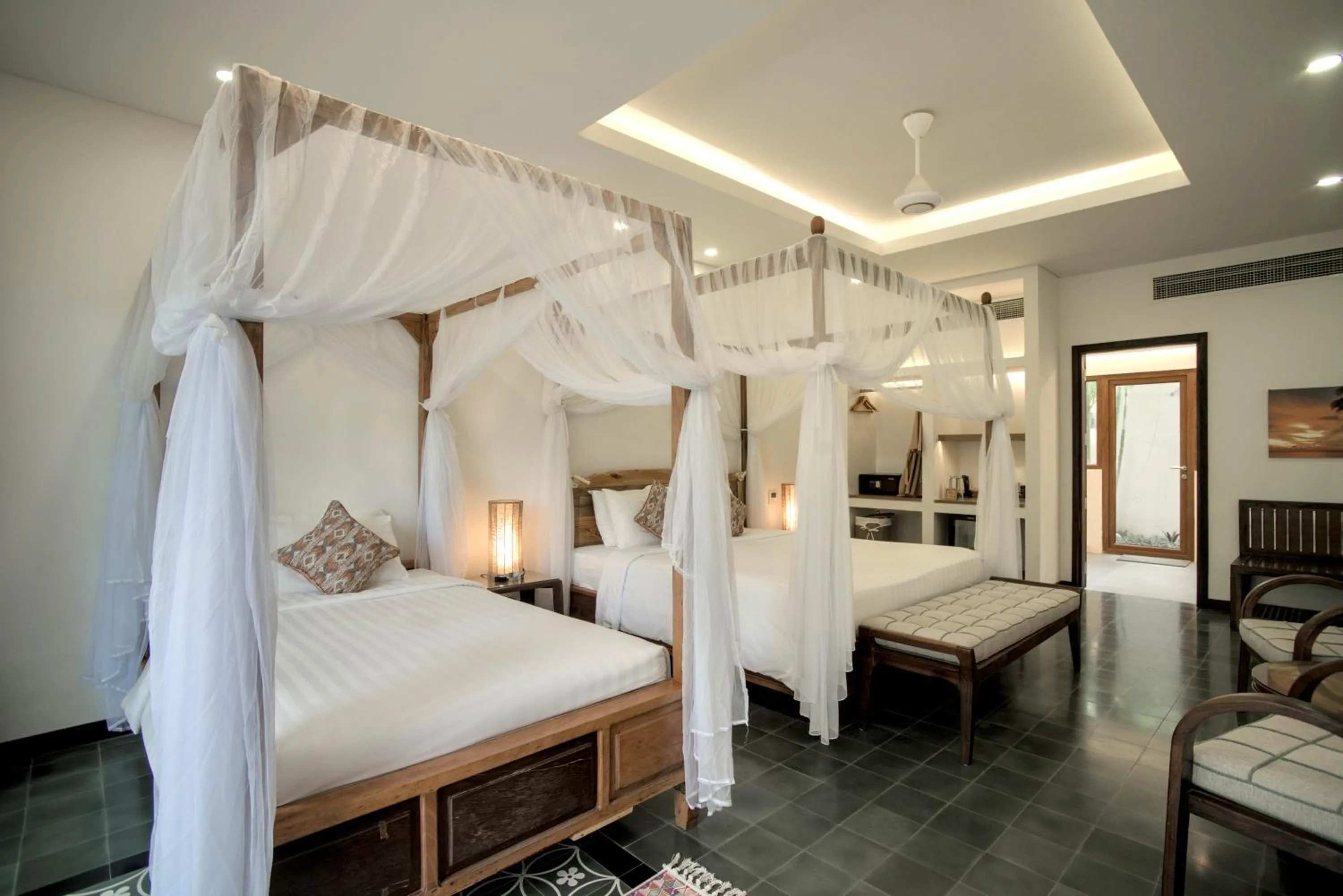 Bed in Cassia Cottage Resort and Spa
