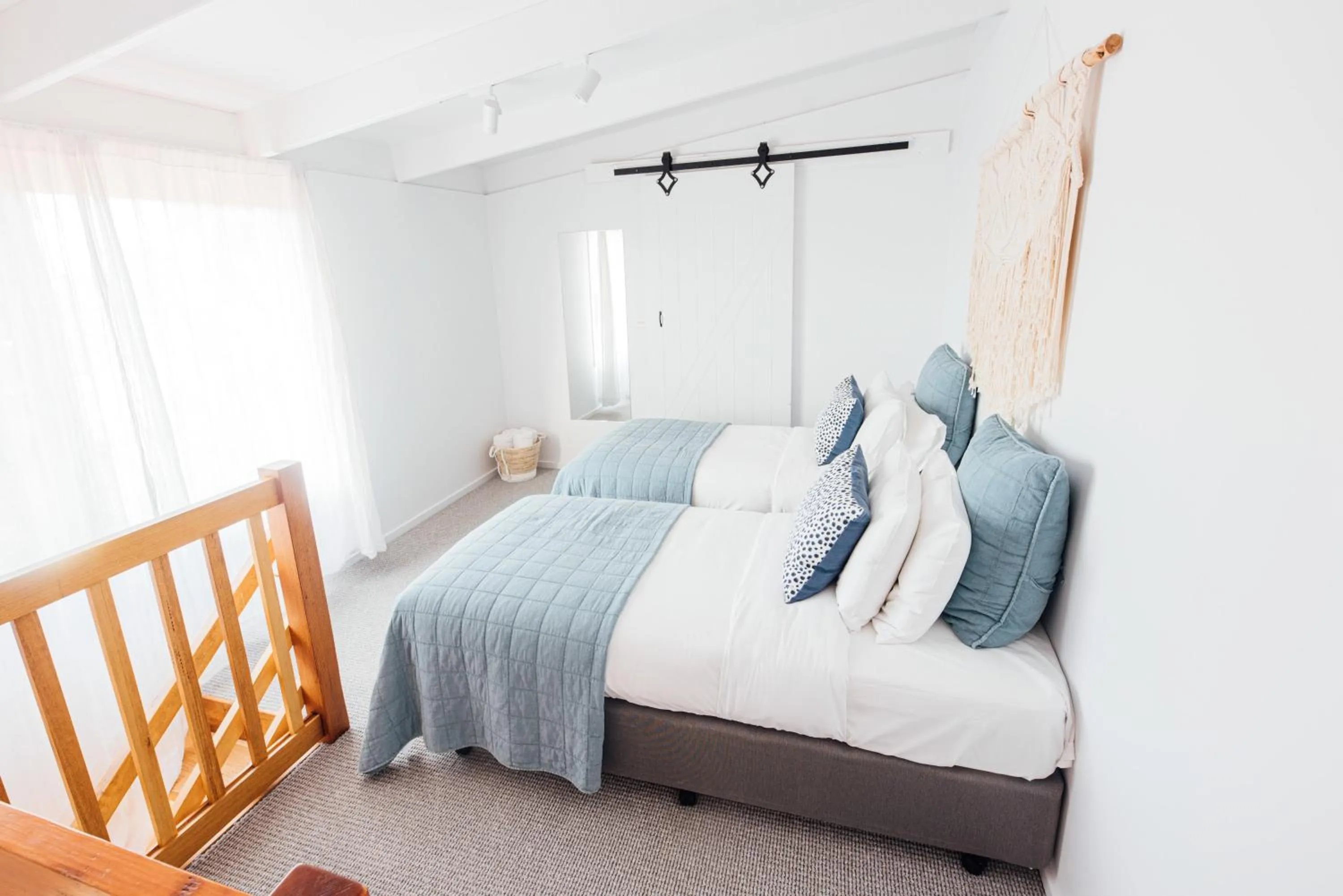 Bed in Port O' Call Motel