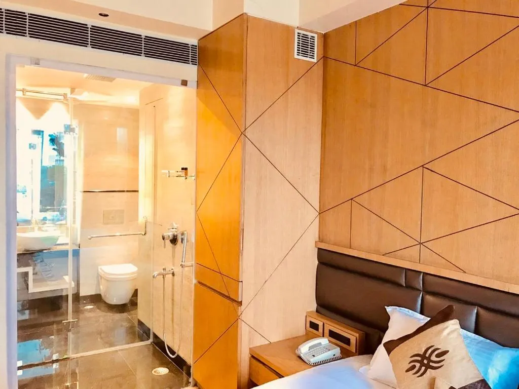 Bed in JRD Pride-Business Hotel