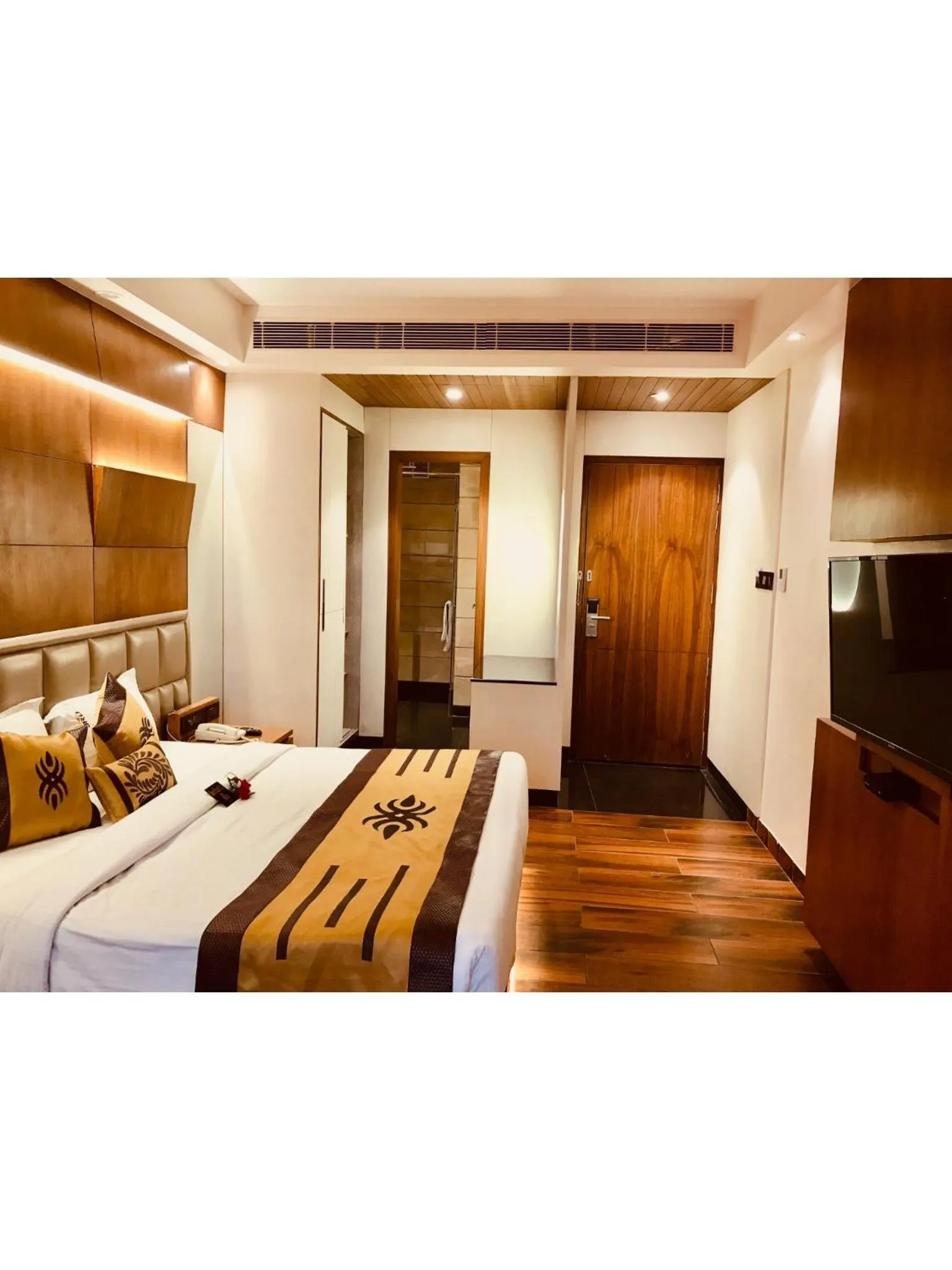 Bed in JRD Pride-Business Hotel