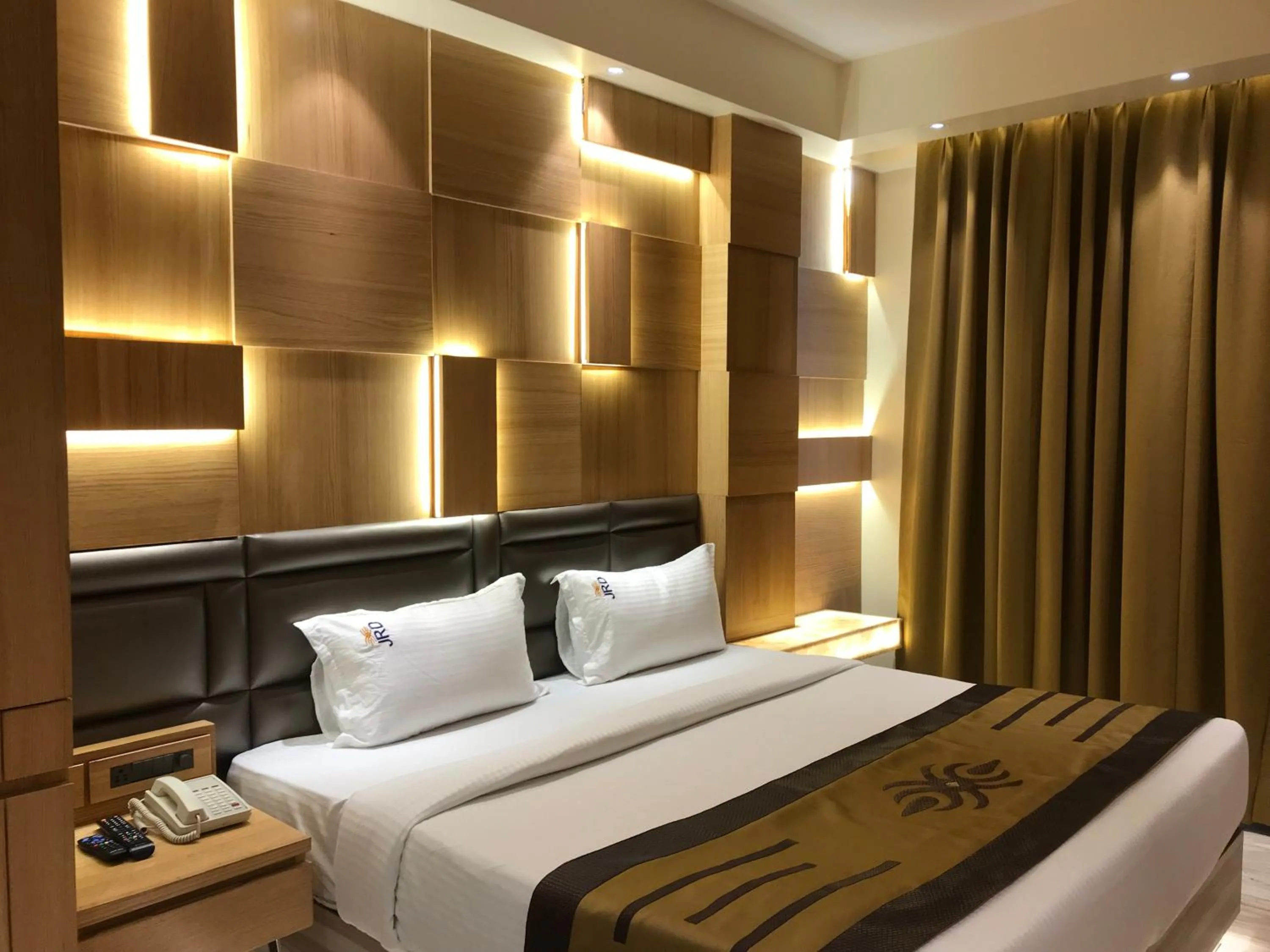 Bed in JRD Pride-Business Hotel