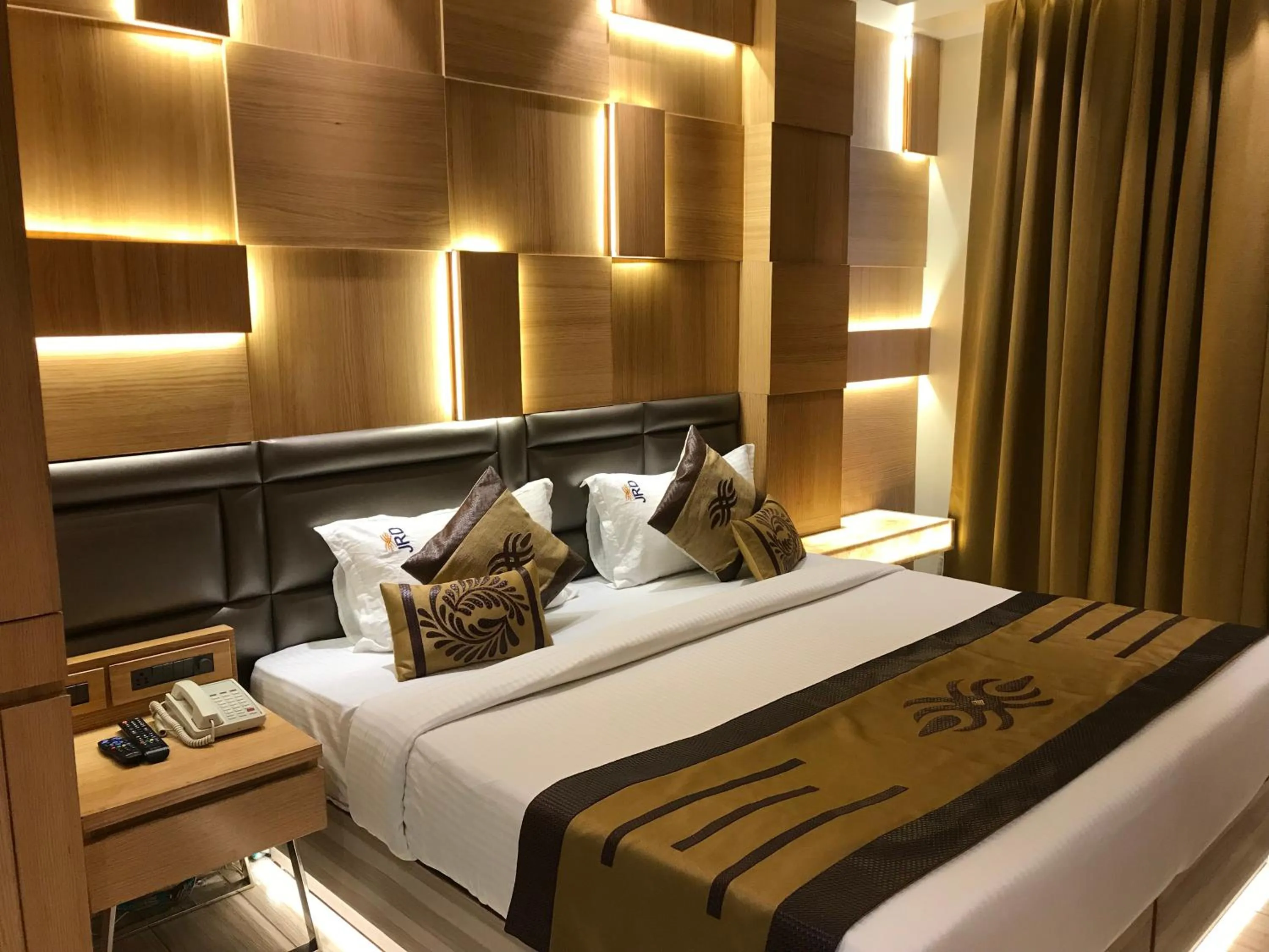 Bed in JRD Pride-Business Hotel