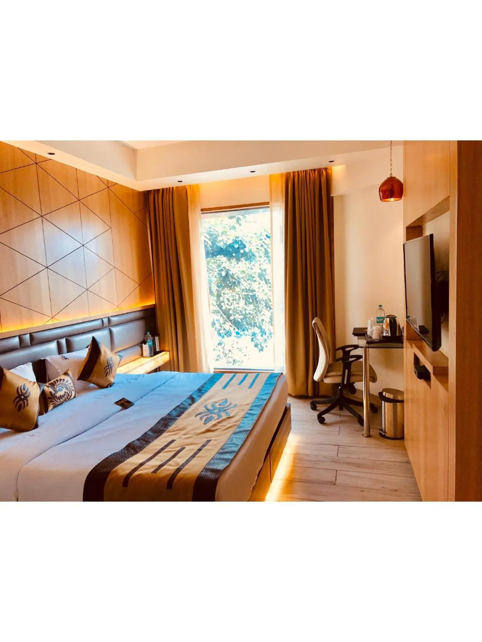 Bed in JRD Pride-Business Hotel