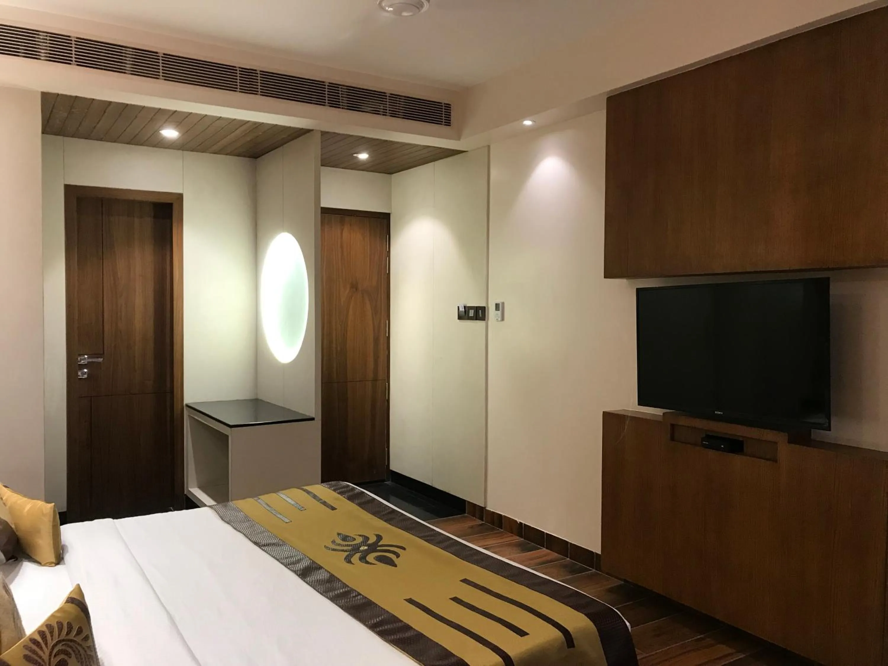 Bed in JRD Pride-Business Hotel