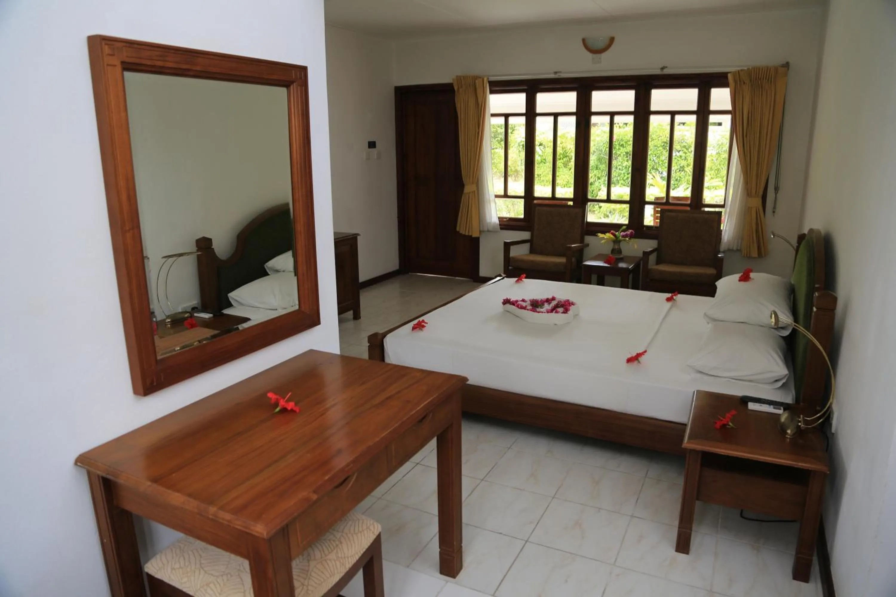 Bed in La Digue Island Lodge