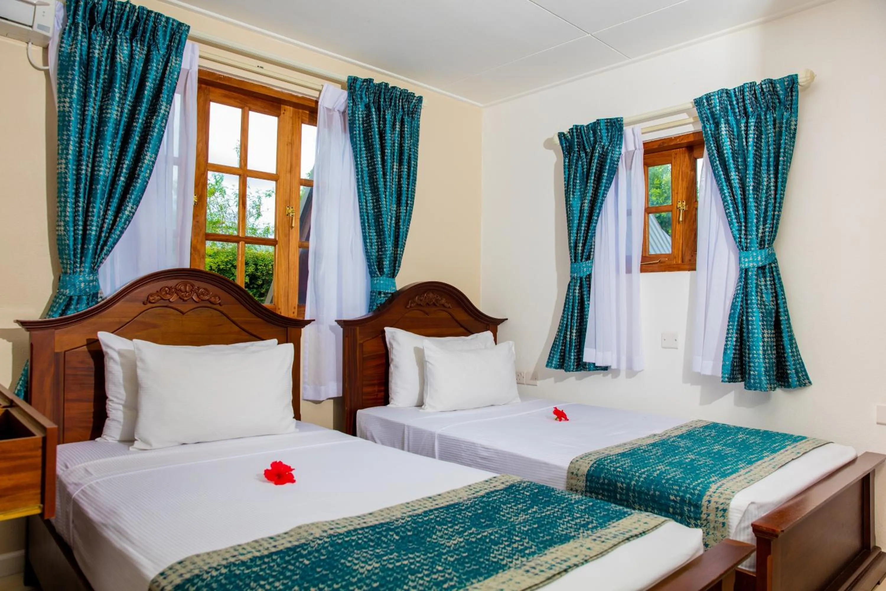 Bed in La Digue Island Lodge