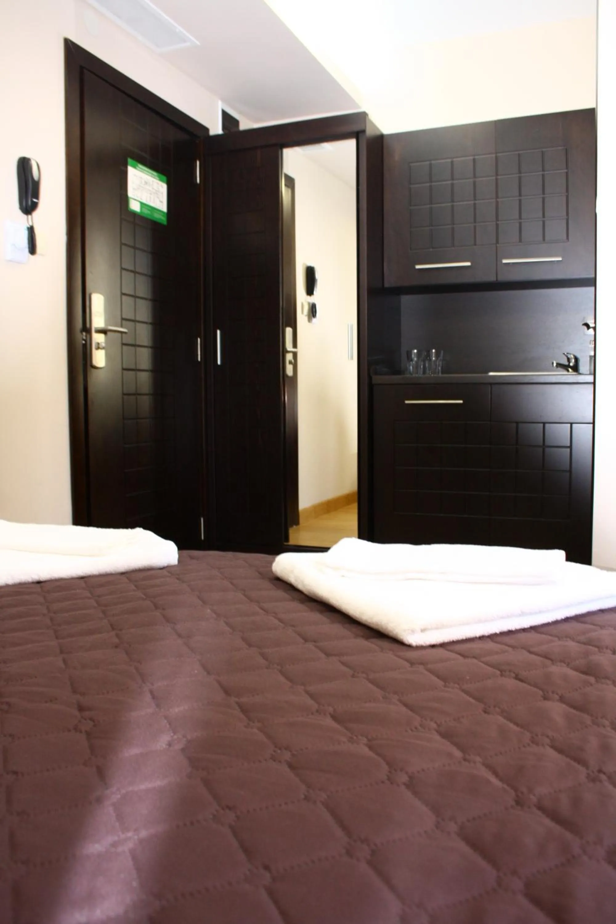 Bed in CityHome Aparthotel